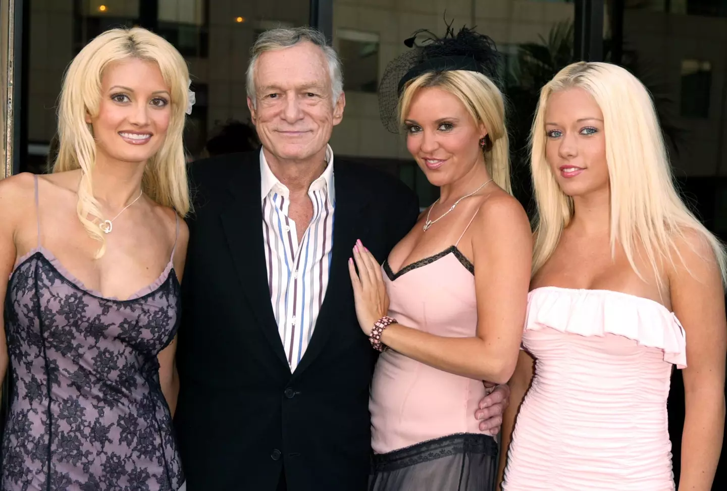Hefner with Holly Madison, Bridget Marquardt and Kendra Wilkinson in 2004 (Frazer Harrison/Getty Images)