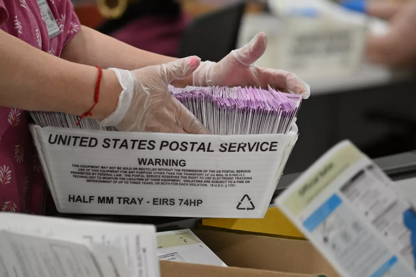 Trump has threatened to ban mail-in votes (ROBYN BECK/AFP via Getty Images)