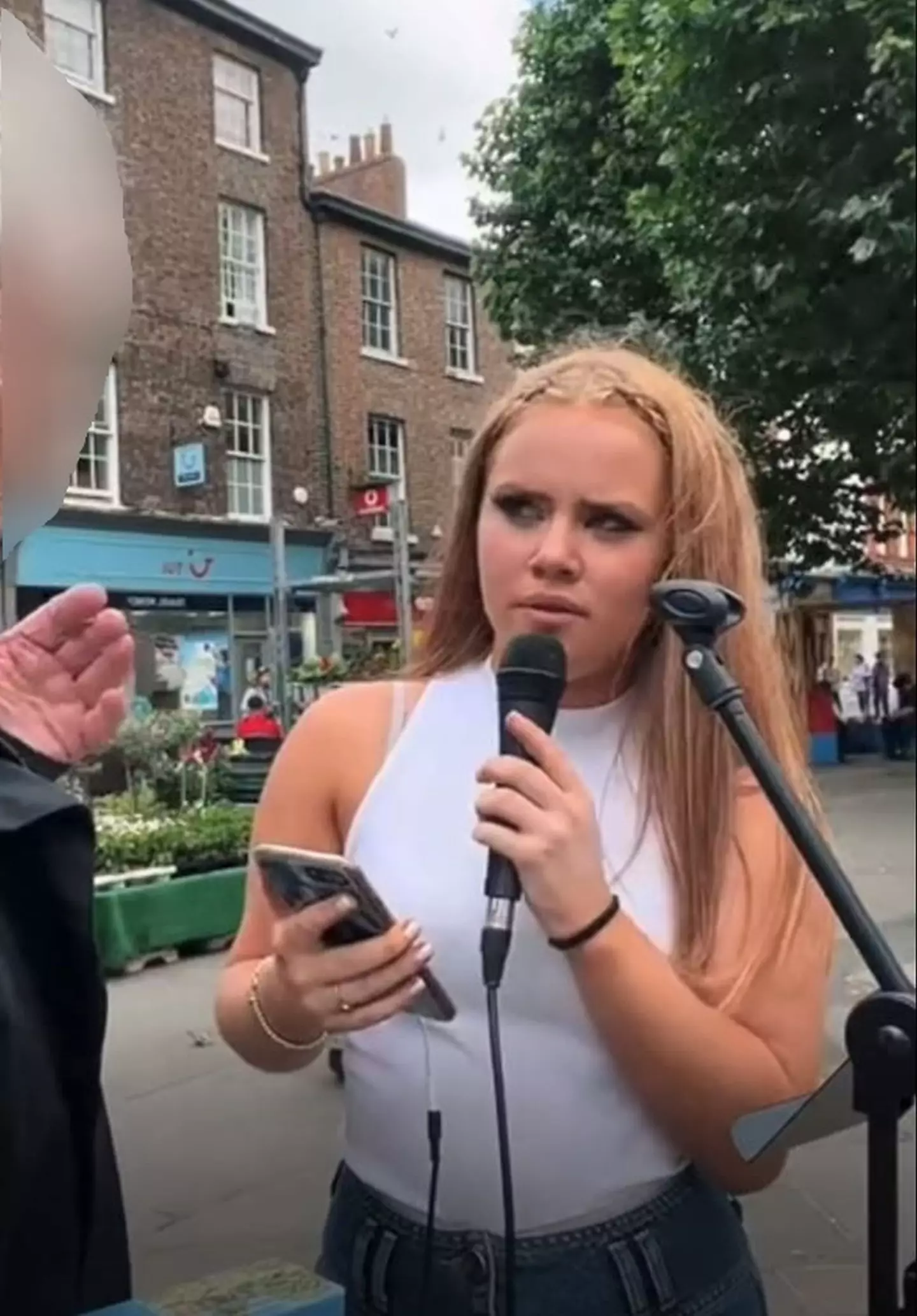 A teenage singer was reduced to tears in the street when a stranger told her 'some people have it… you don't'.