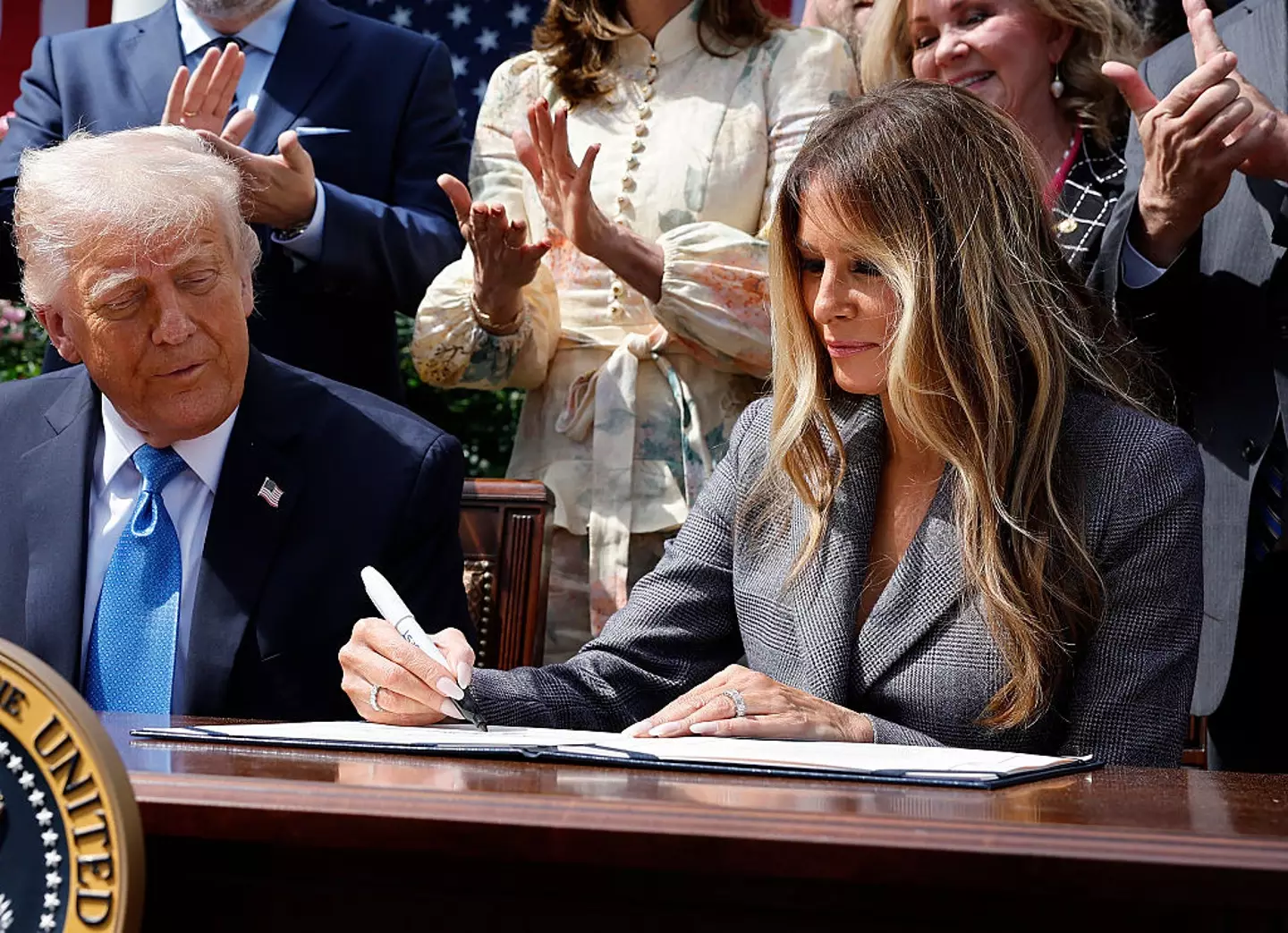 US president Donald Trump and first lady Melania Trump signed into law the Take It Down Act on Monday (19 May) (Chip Somodevilla / Staff / Getty Images)