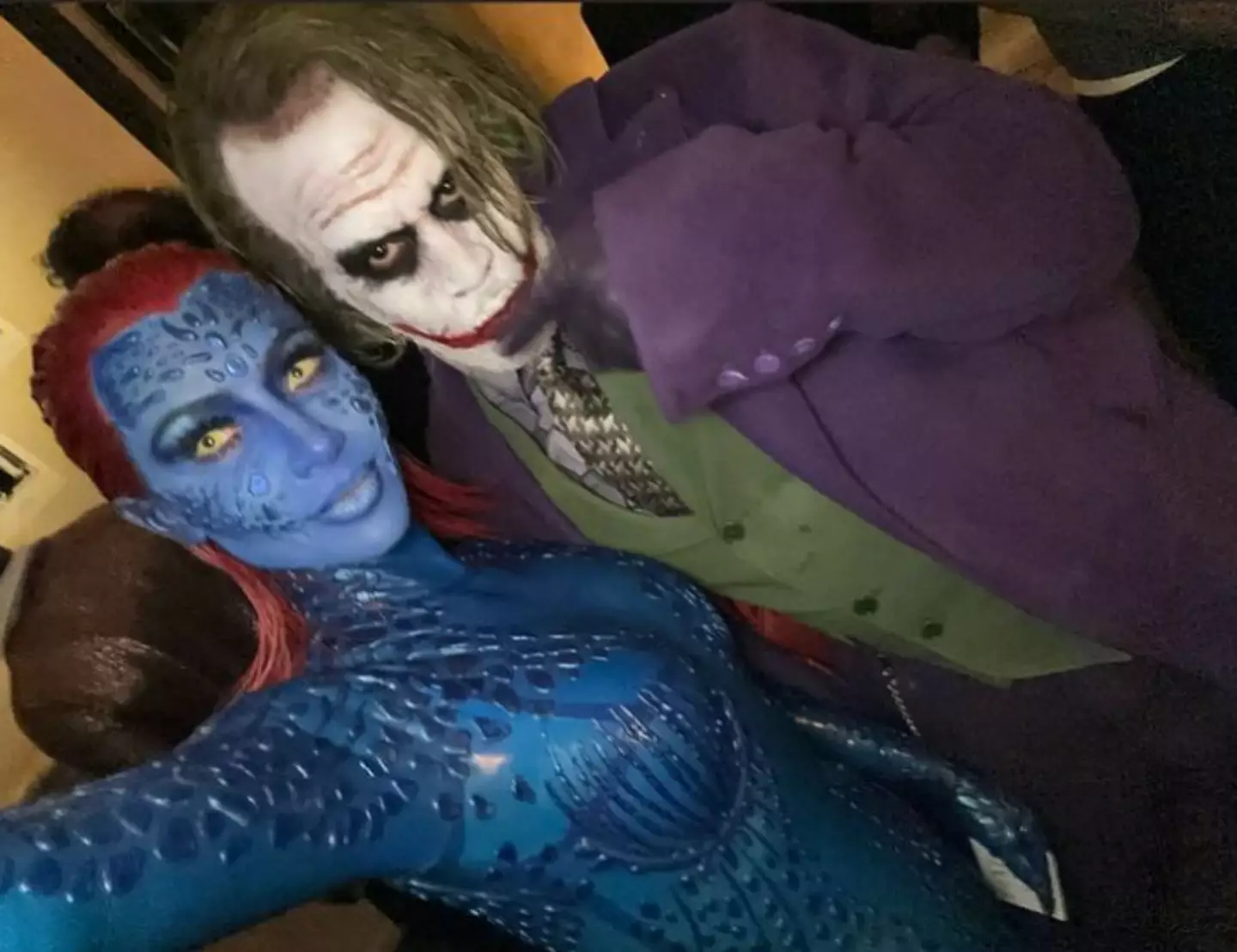 Kim dressed as Mystique for Halloween.