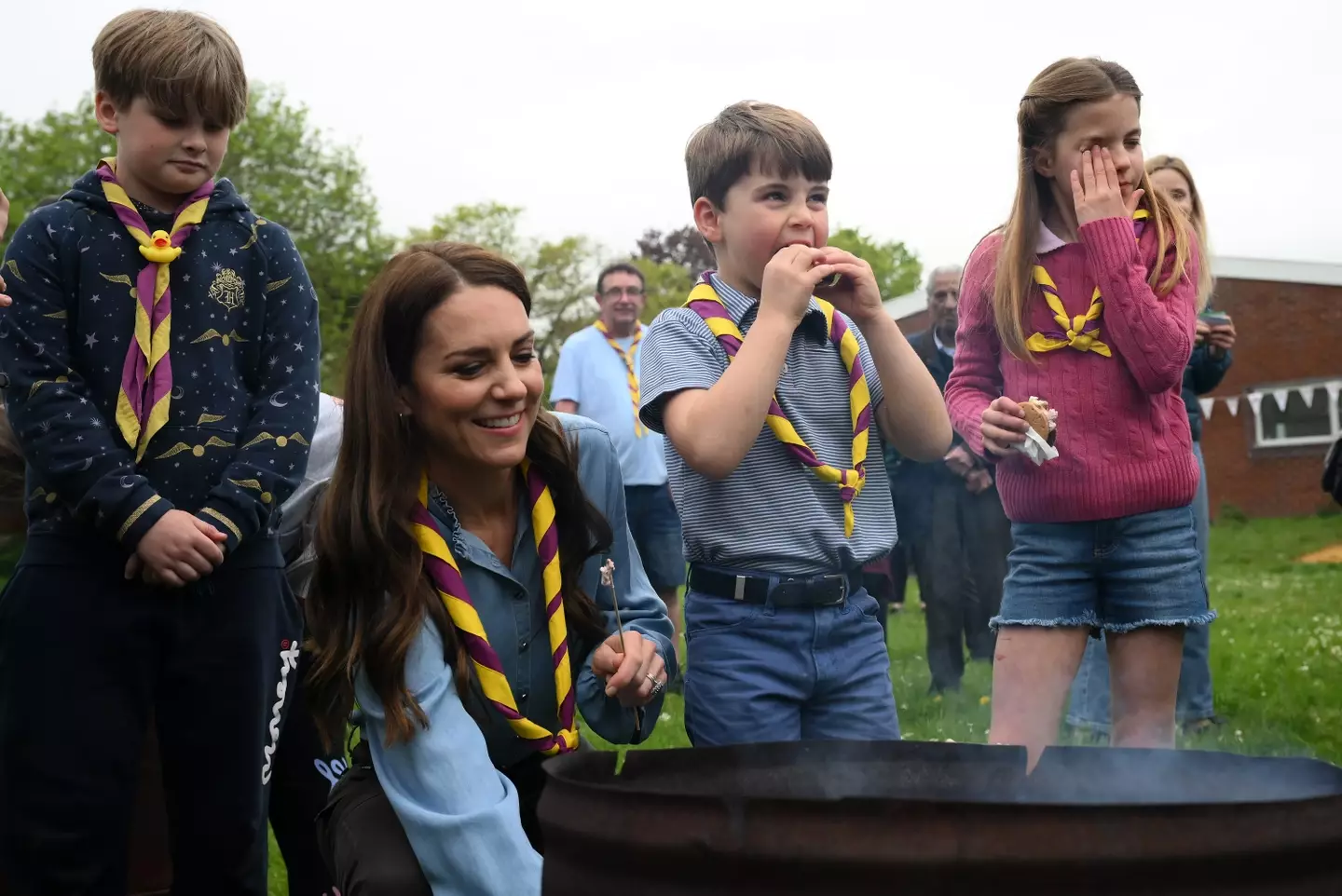 Prince Louis wasted no time enjoying his s'more.