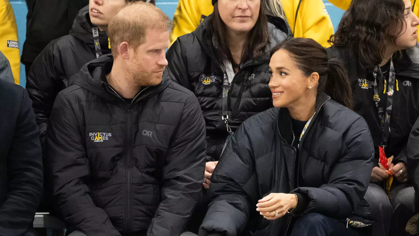 Lip reader 'reveals' what Meghan Markle actually said to Prince Harry during PDA moment at latest appearance