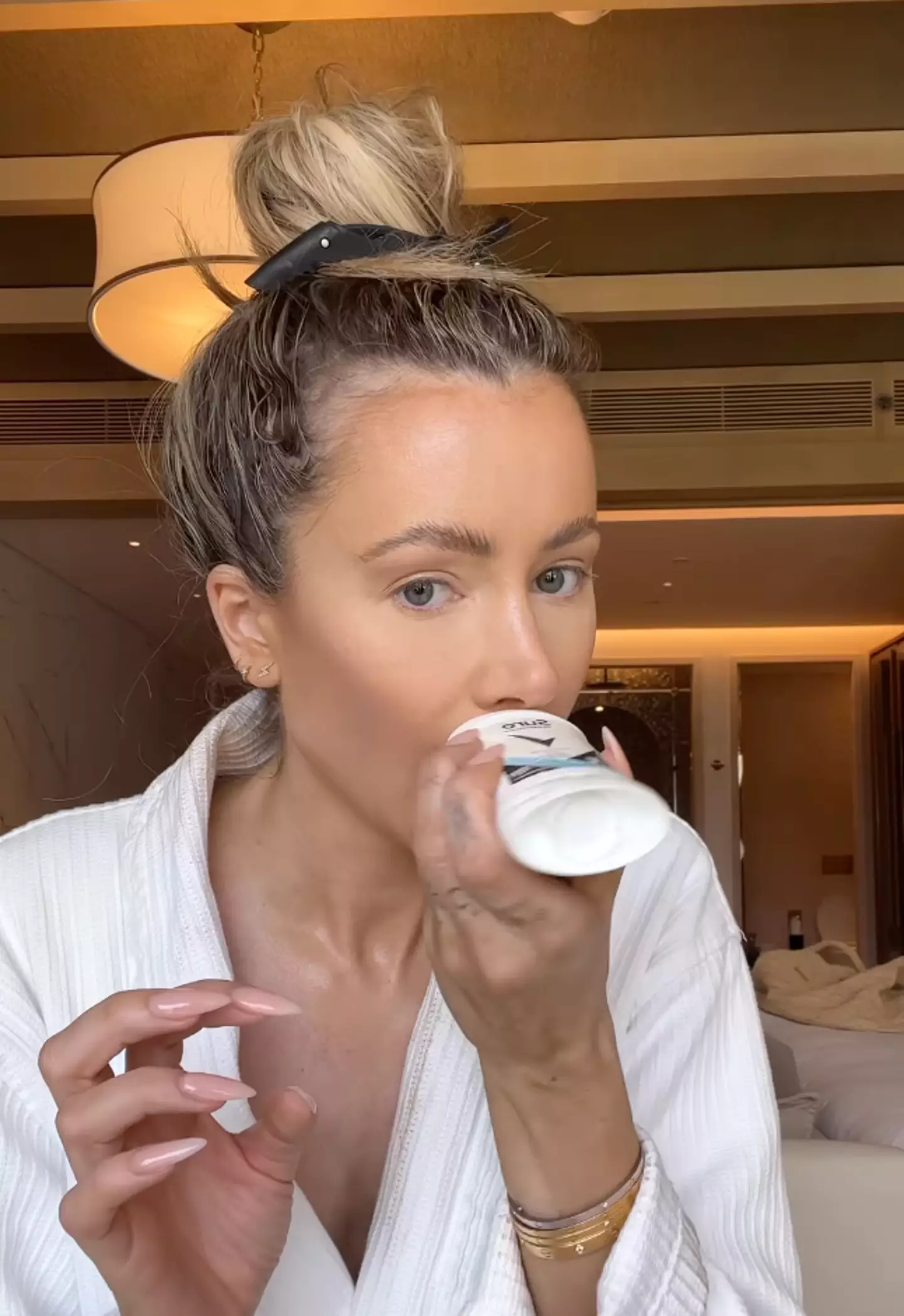 Attwood applied deodorant just above her top lip.