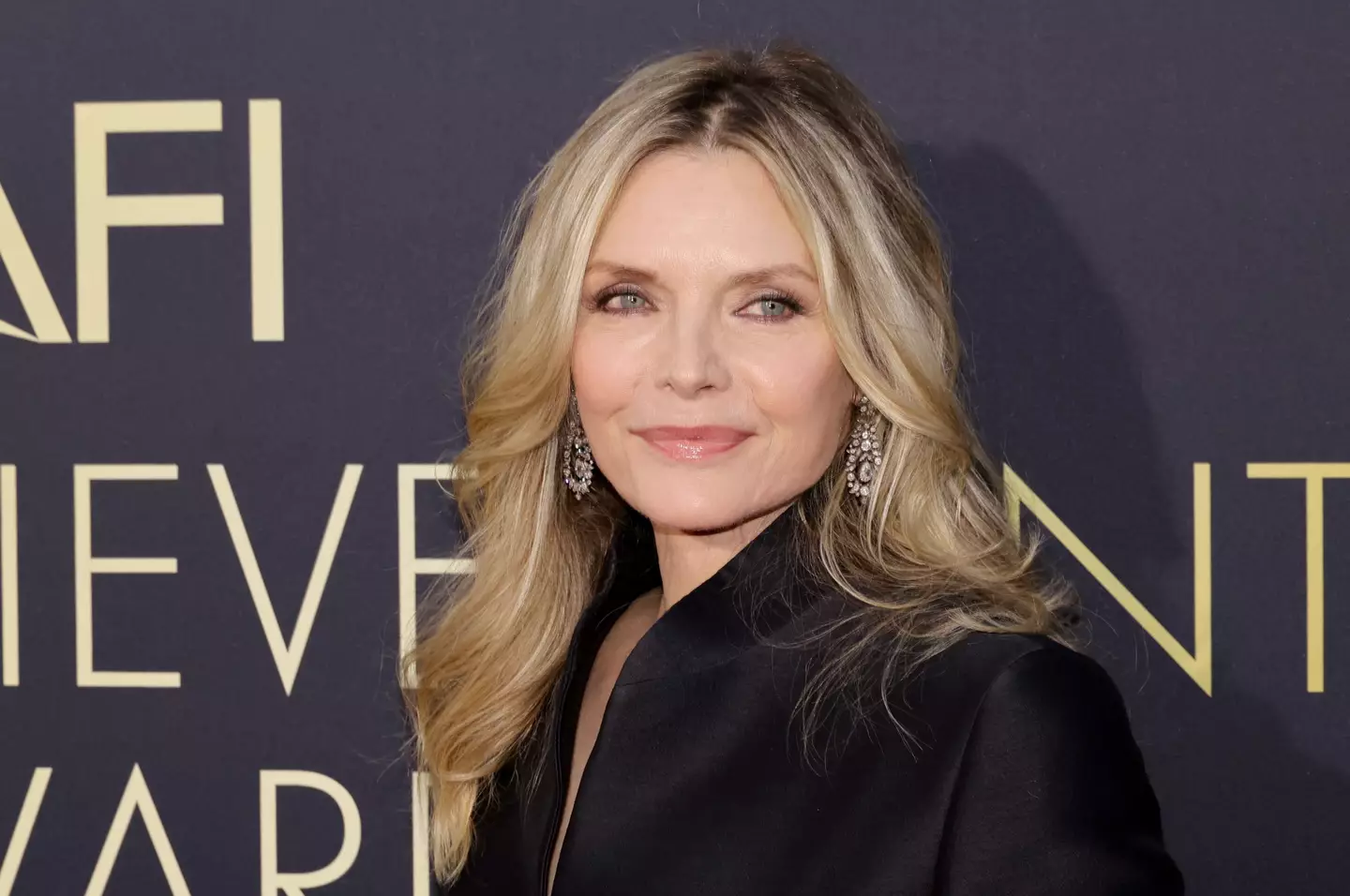 Michelle Pfeiffer has also revealed her own experience of being in a cult at just 20 years old. (Kevin Winter/Getty Images for Warner Bros. Discovery)