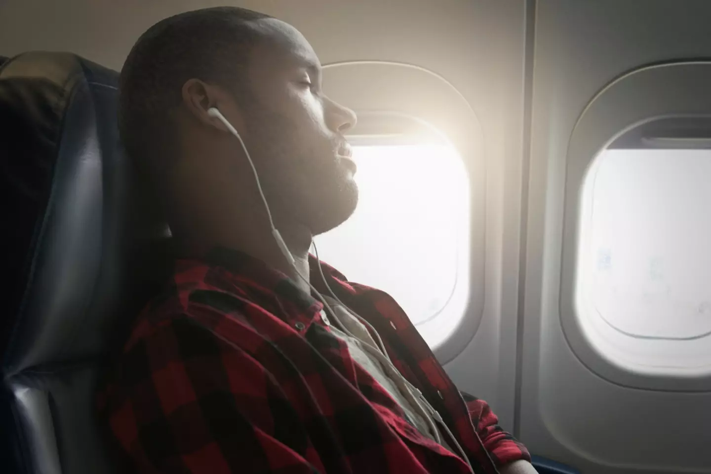 A doctor recommended that you don't sleep after alighting from a long-haul flight. Jose Luis Pelaez Inc/Getty Stock Images