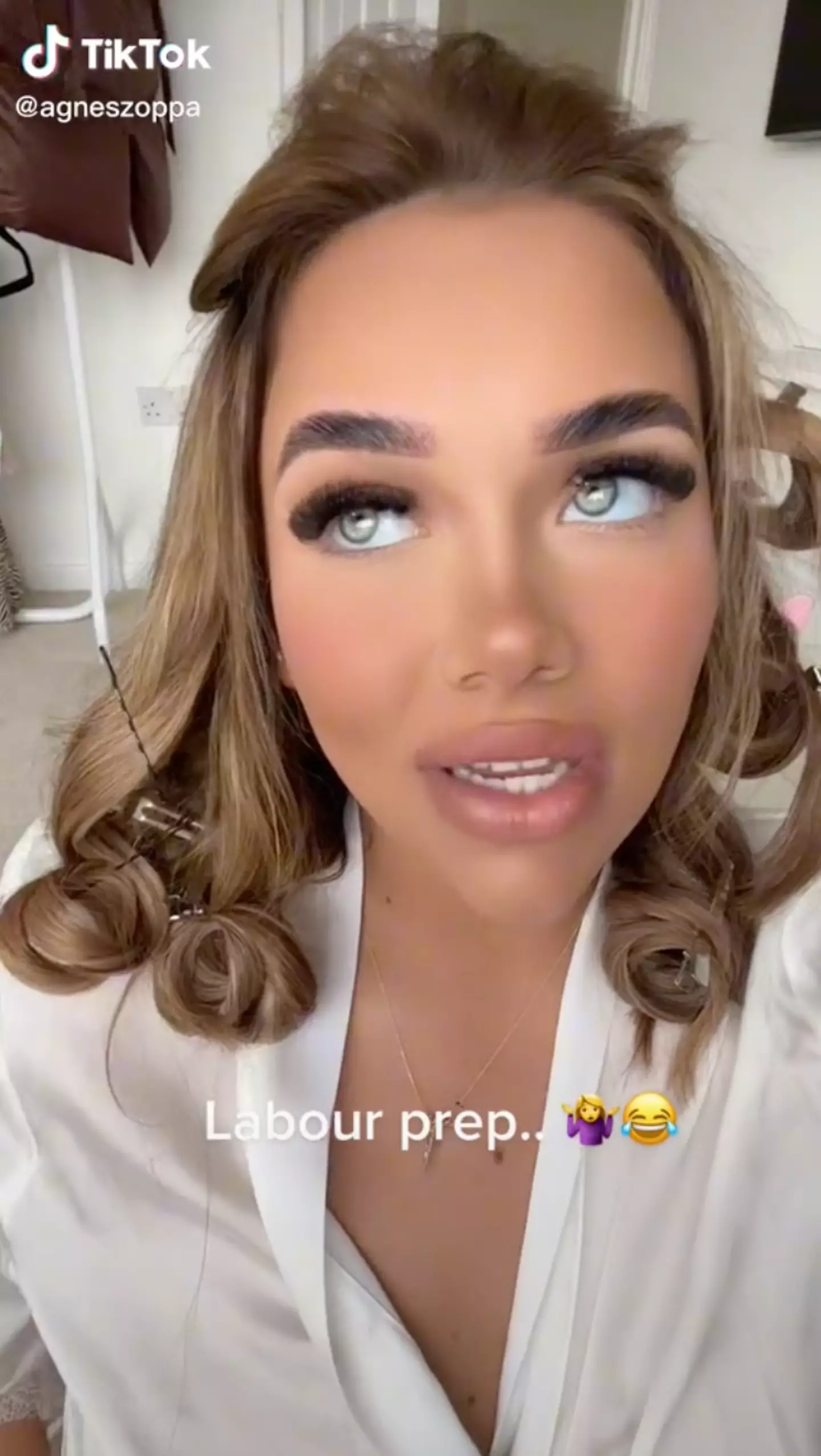 Agnes had her hair perfectly curled in case the baby came.