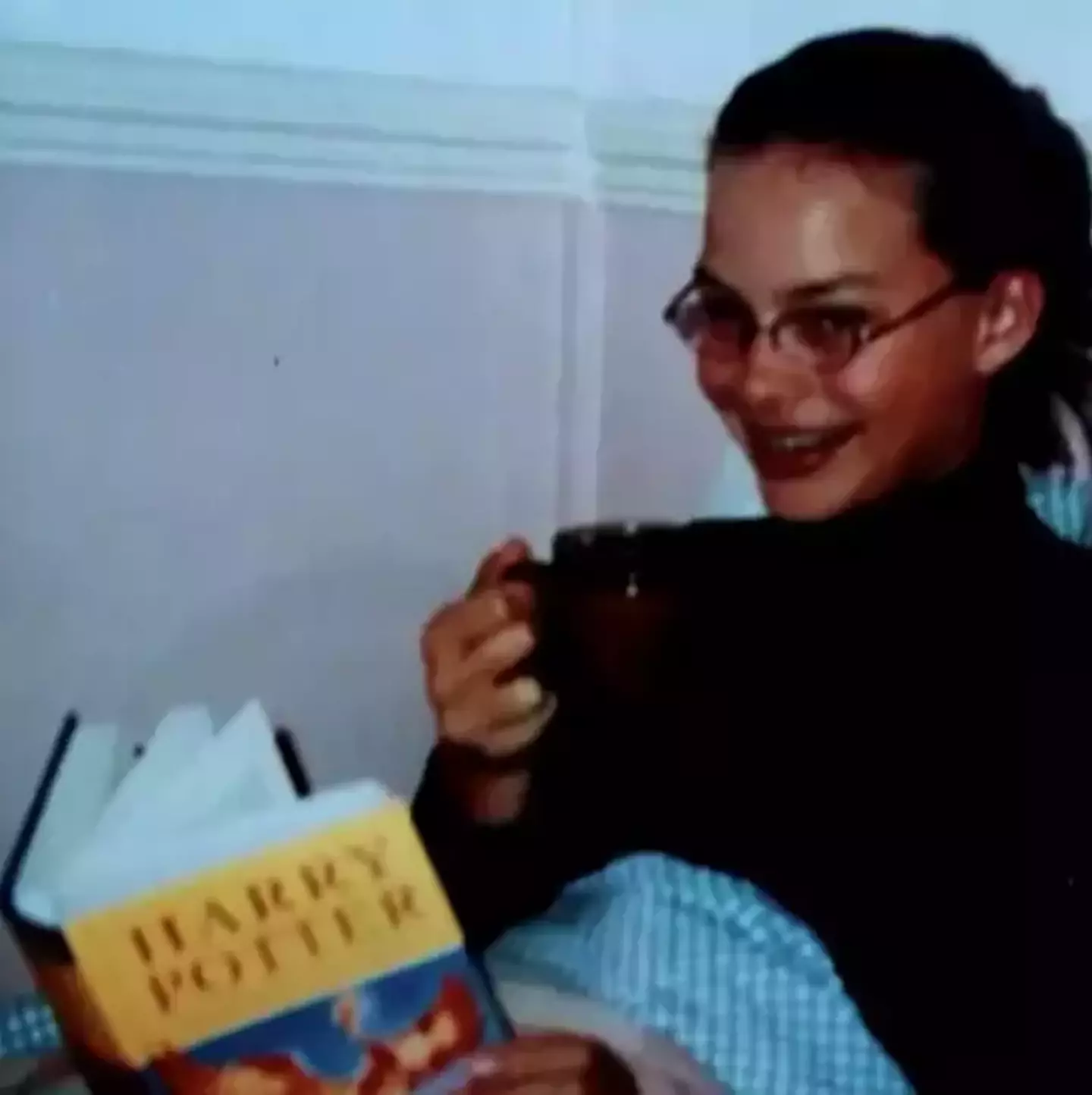 A young Margot Robbie - obsessed with all things Hogwarts.