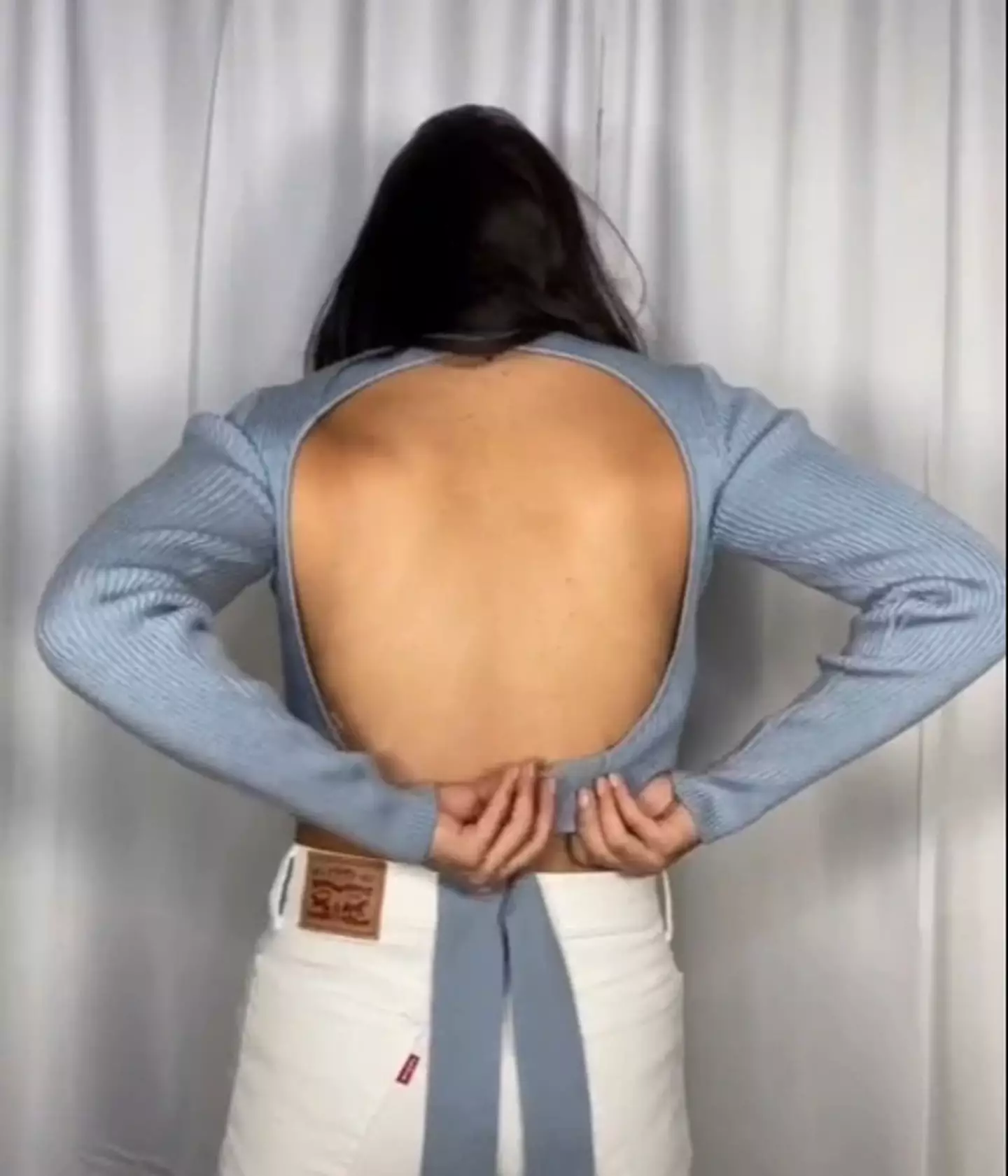 Janette's bra straps are not visible thanks to the hack. (