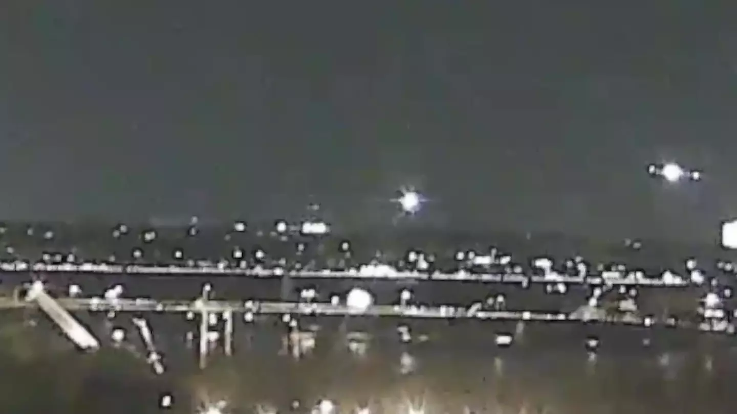 Officials 'don't know if there are survivors' as American Airlines flight crashes into helicopter and 'splits in half' mid-air