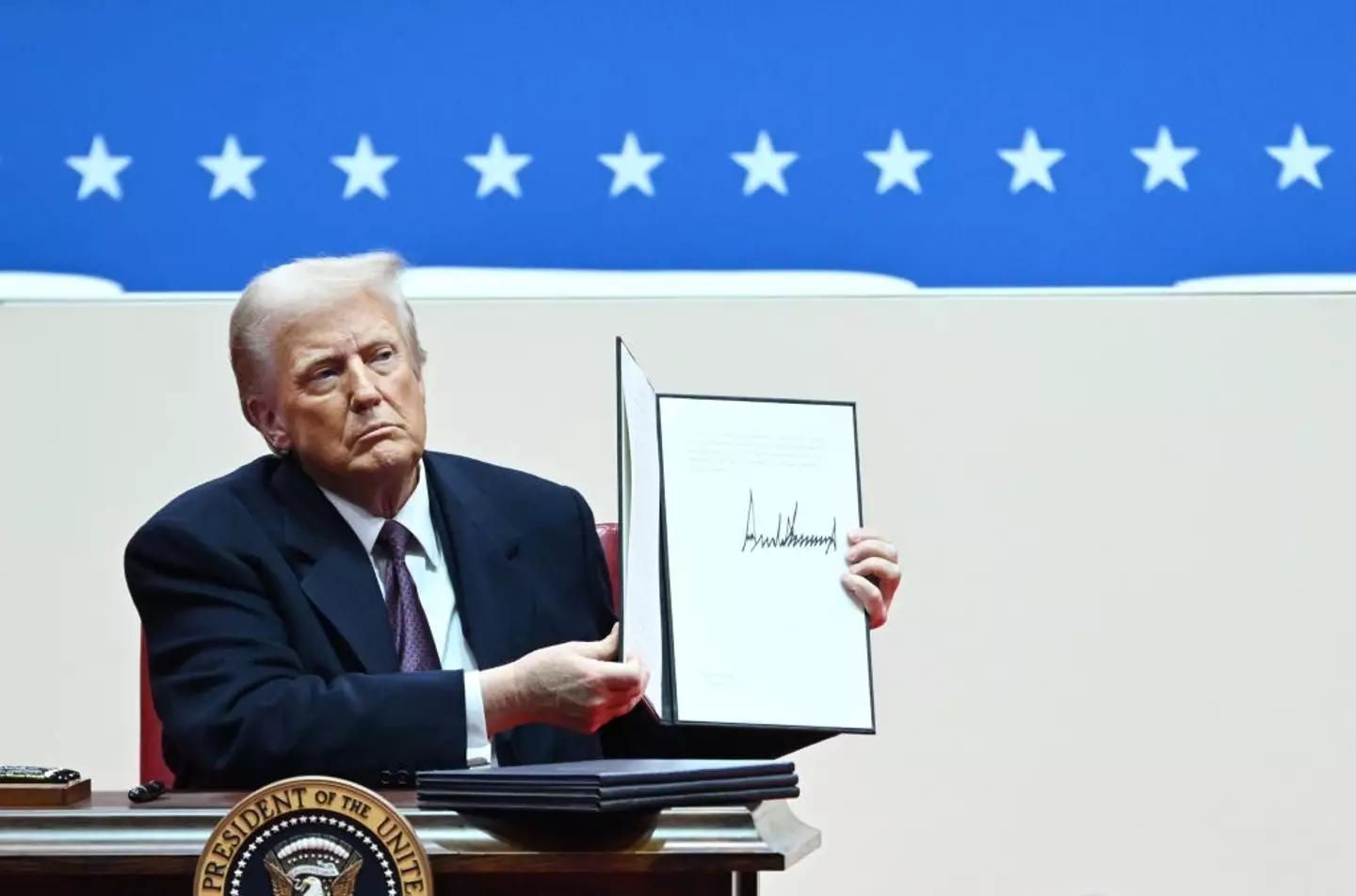 The president has signed a record number of executive orders during his first week. (Matt McClain/The Washington Post via Getty Images)