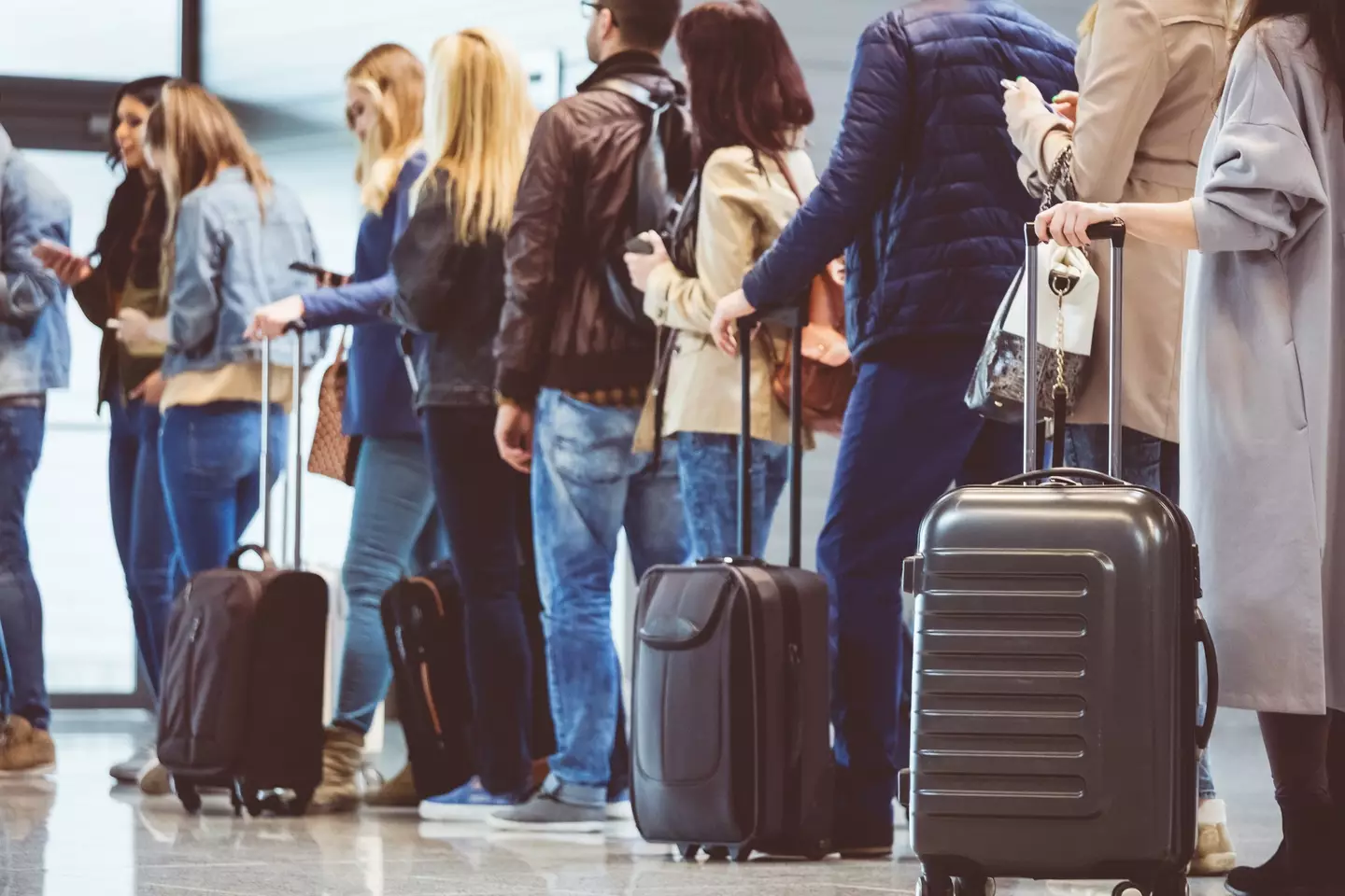Ryanair has warned against black, navy and grey suitcases when travelling. (izusek / Getty Images)