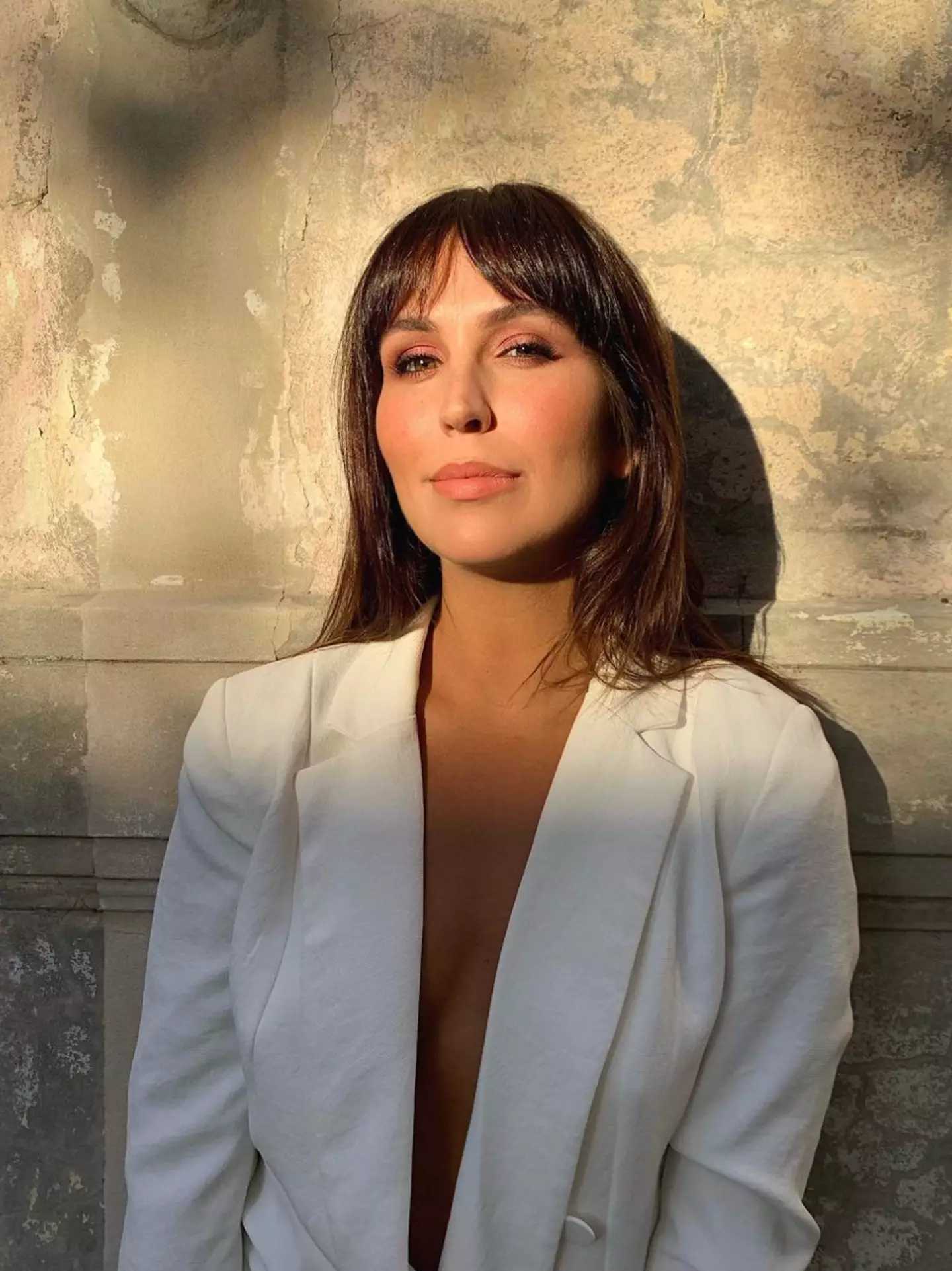 Sara looks totally different.