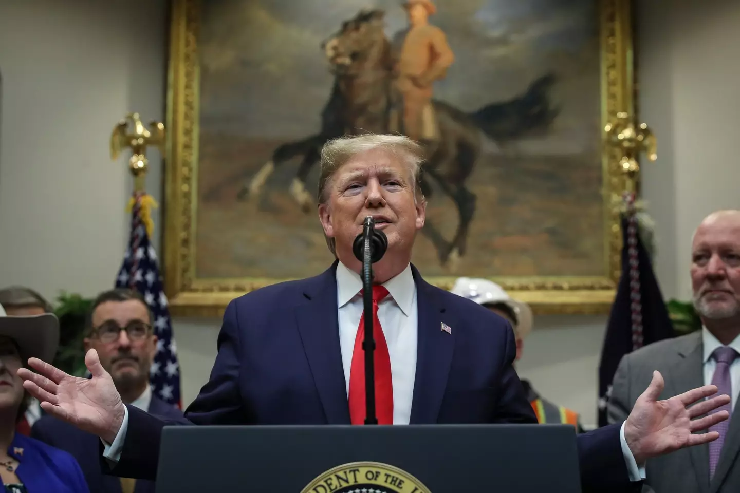 Trump previously described climate change as a 'hoax' (Drew Angerer/Getty Images)