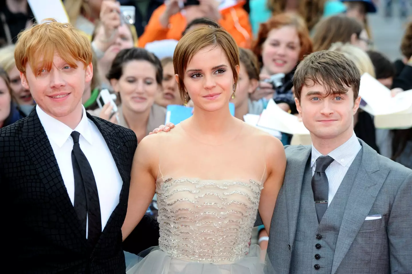 Emma Watson and Daniel Radcliffe with Harry Potter co-star Rupert Grint. (Anthony Harvey/Getty Images)