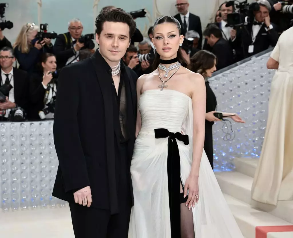 Brooklyn Beckham and his wife Nicola Peltz have distanced themselves from the Beckham family (Jamie McCarthy/Getty Images)