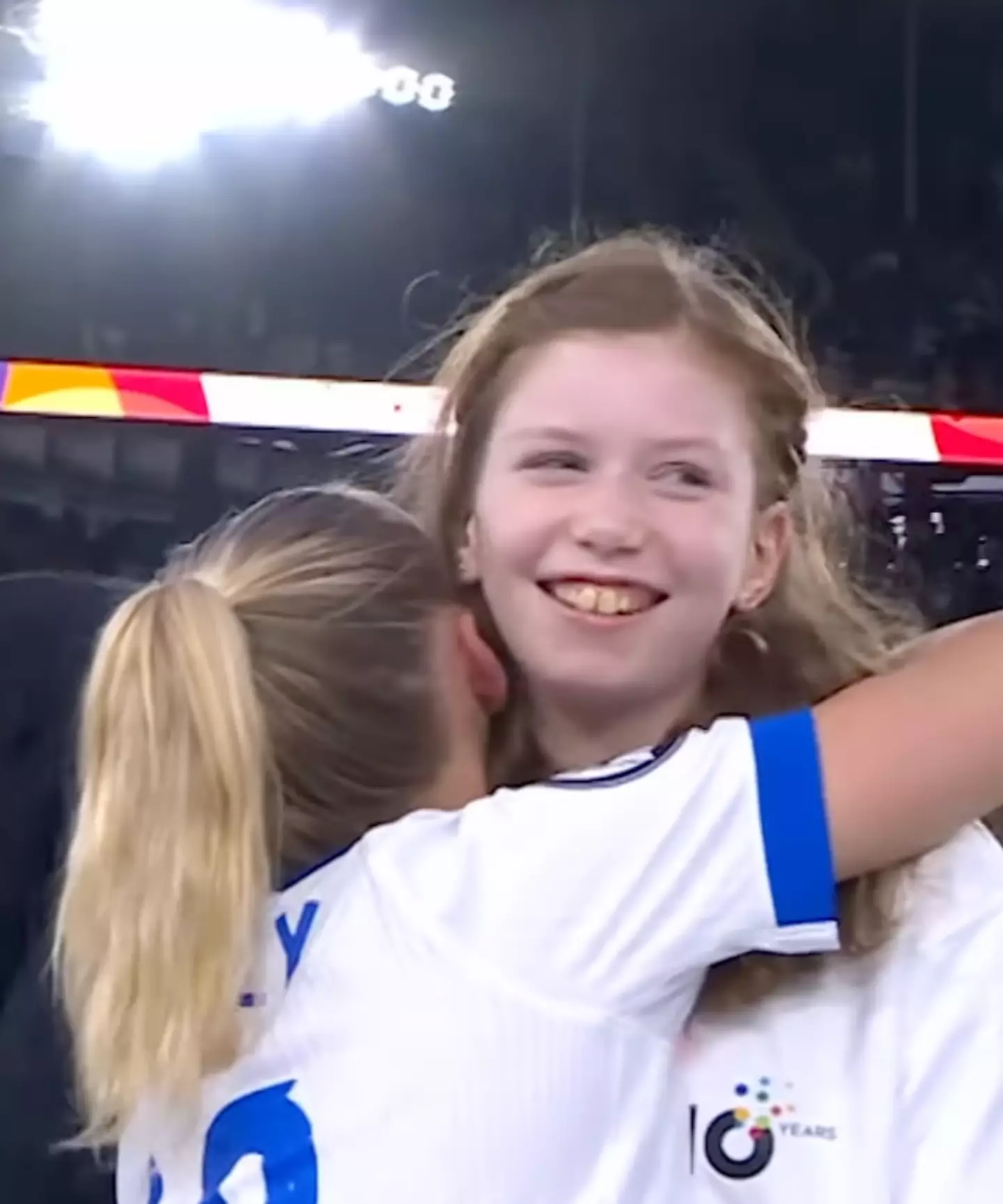 England's Chloe Kelly offered Greta, 12, a big hug during the trophy ceremony (Instagram/@uefa_official)