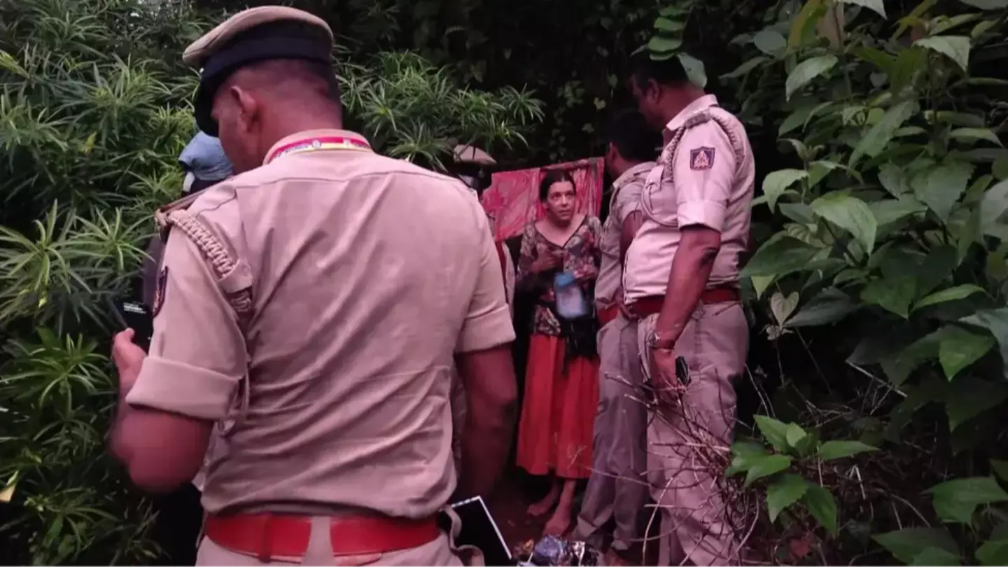 Chilling mystery as mum and kids are found living inside cave surrounded by snakes