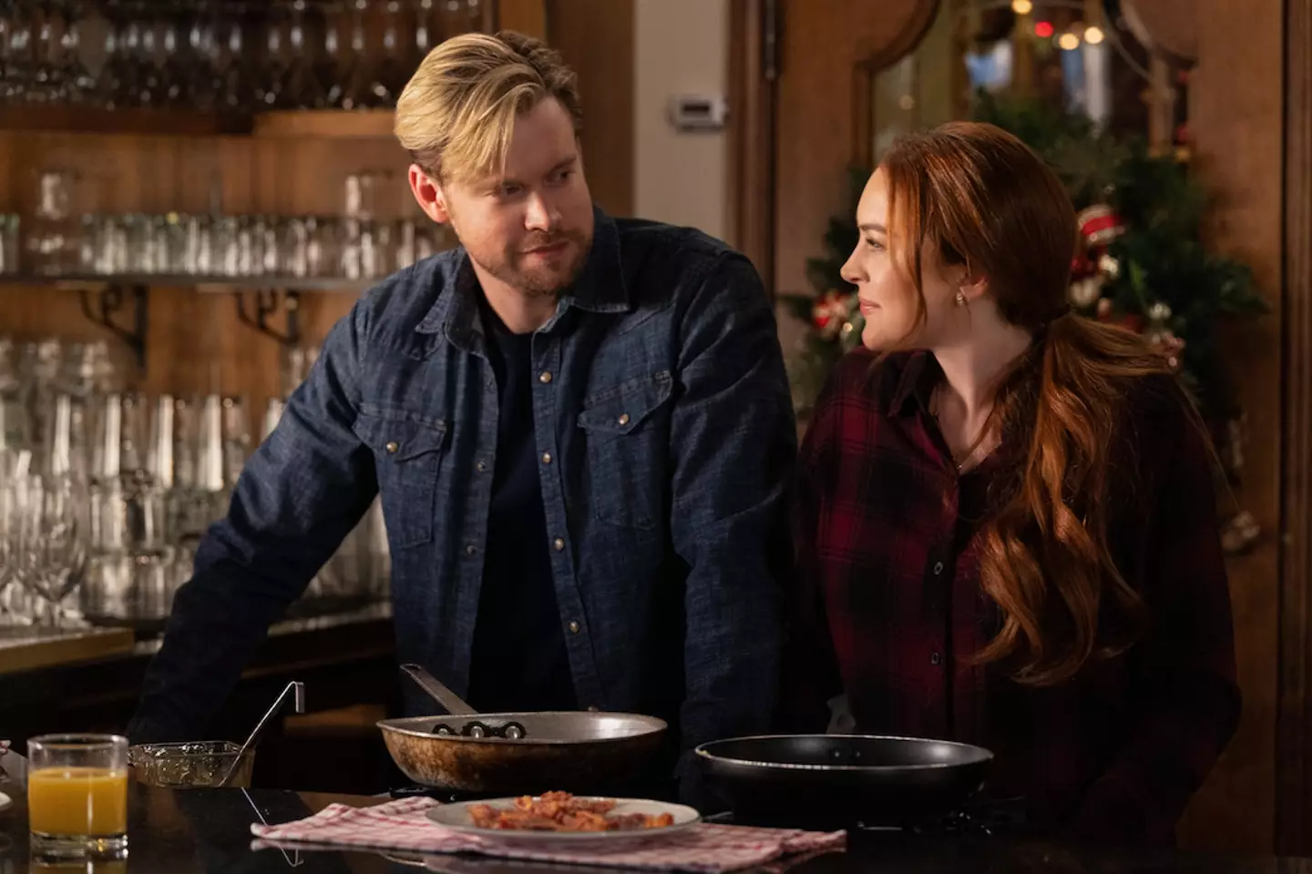 Lindsay Lohan and Chord Overstreet in Falling for Christmas.