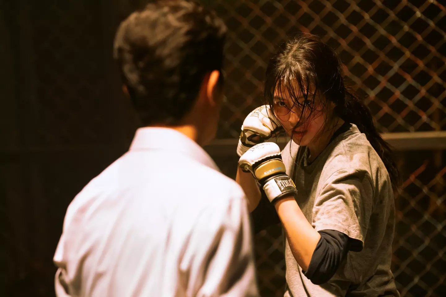 Jiwoo trains at the martial arts gym (