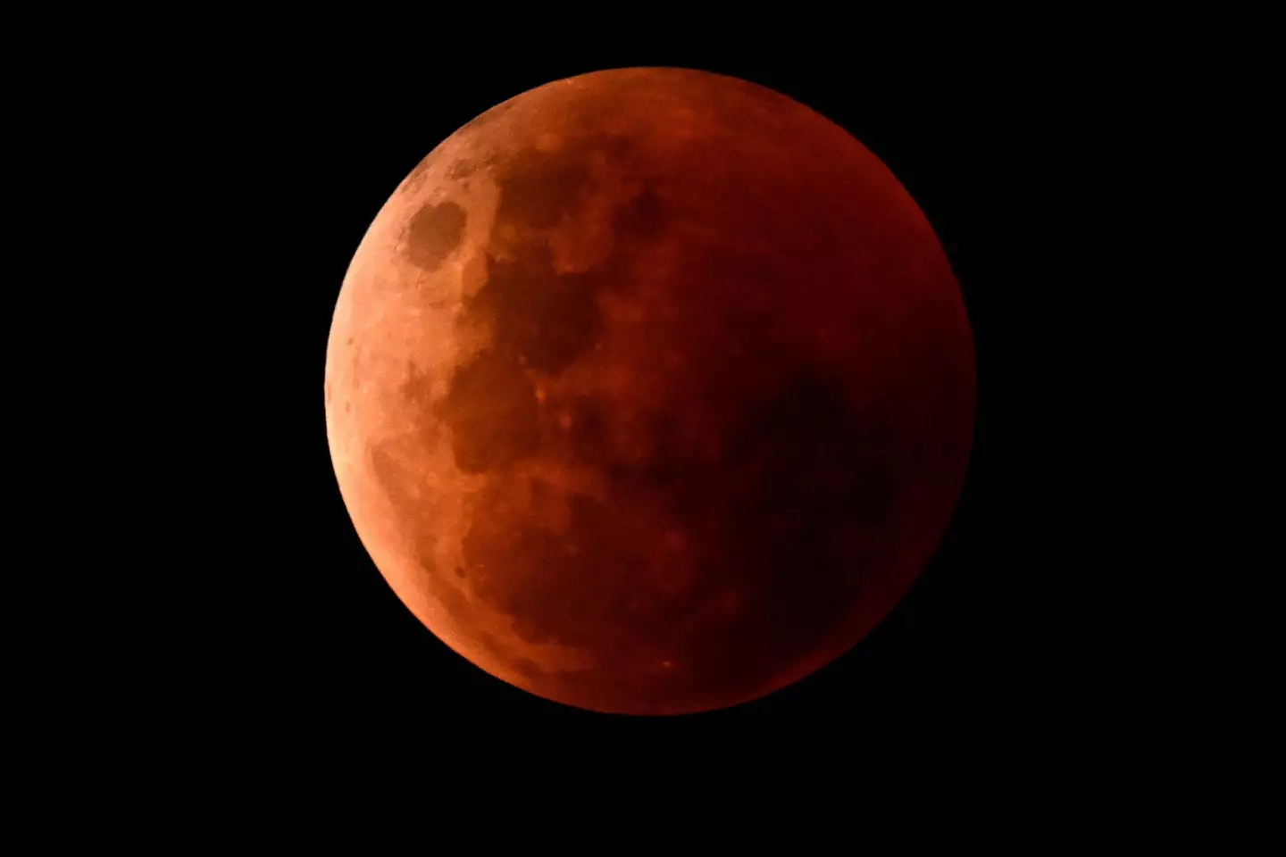 The lunar eclipse could be the reason behind your bad night's sleep. (WILLIAM WEST/AFP via Getty Images)