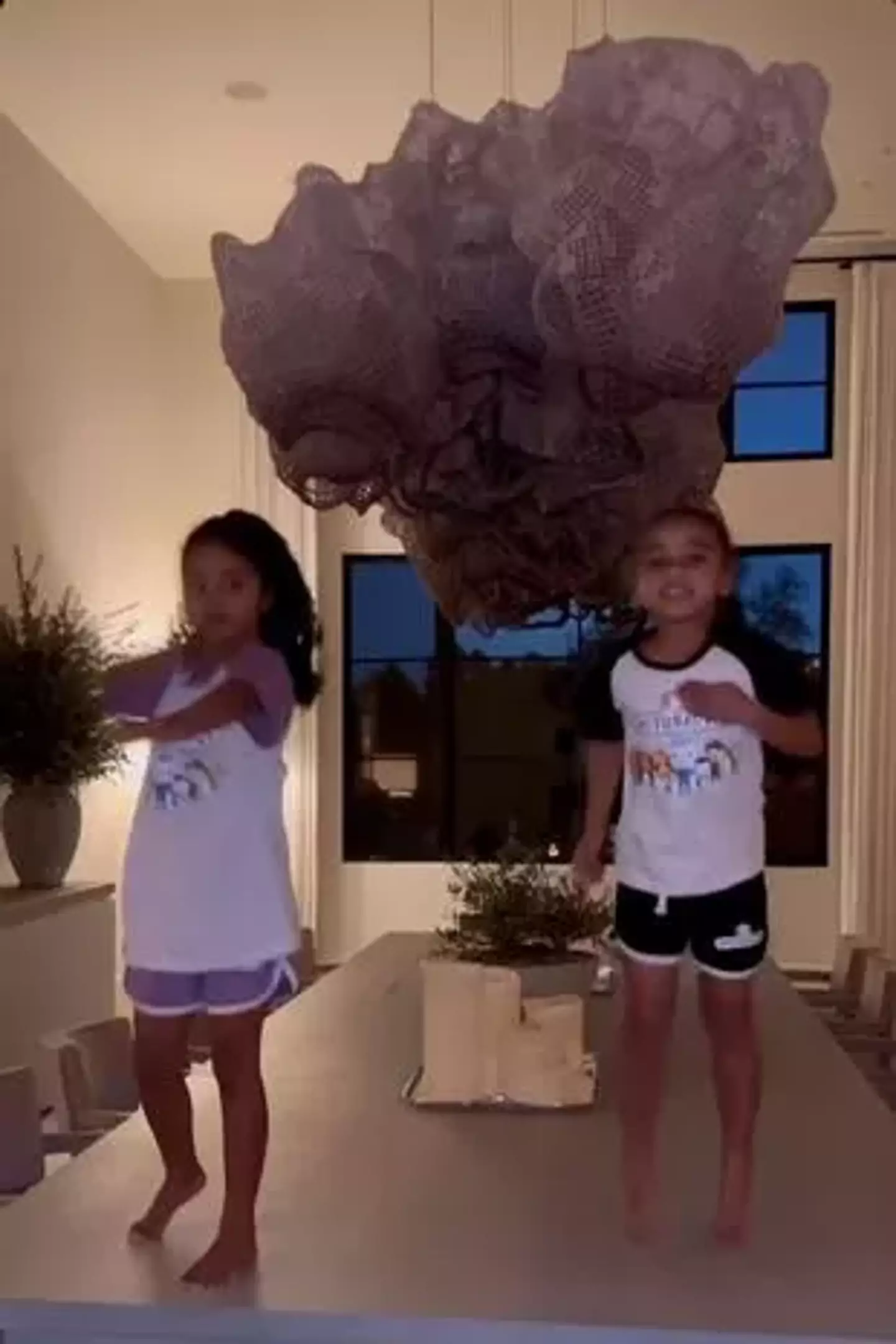 Khloe Kardashian uploaded the video to her Instagram Stories showing her daughter and niece dancing on the table.