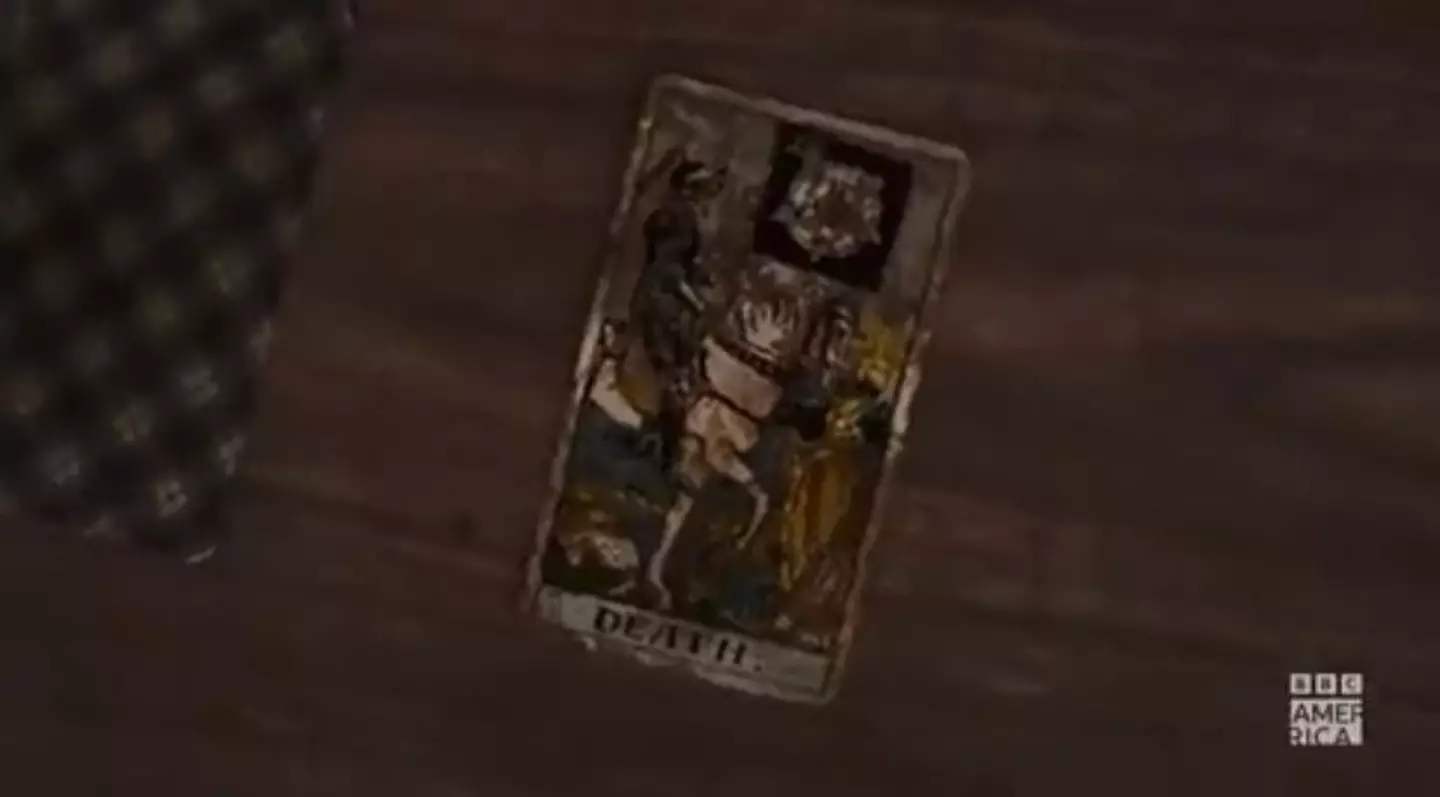 A 'death' tarot card can be seen in the trailer. (