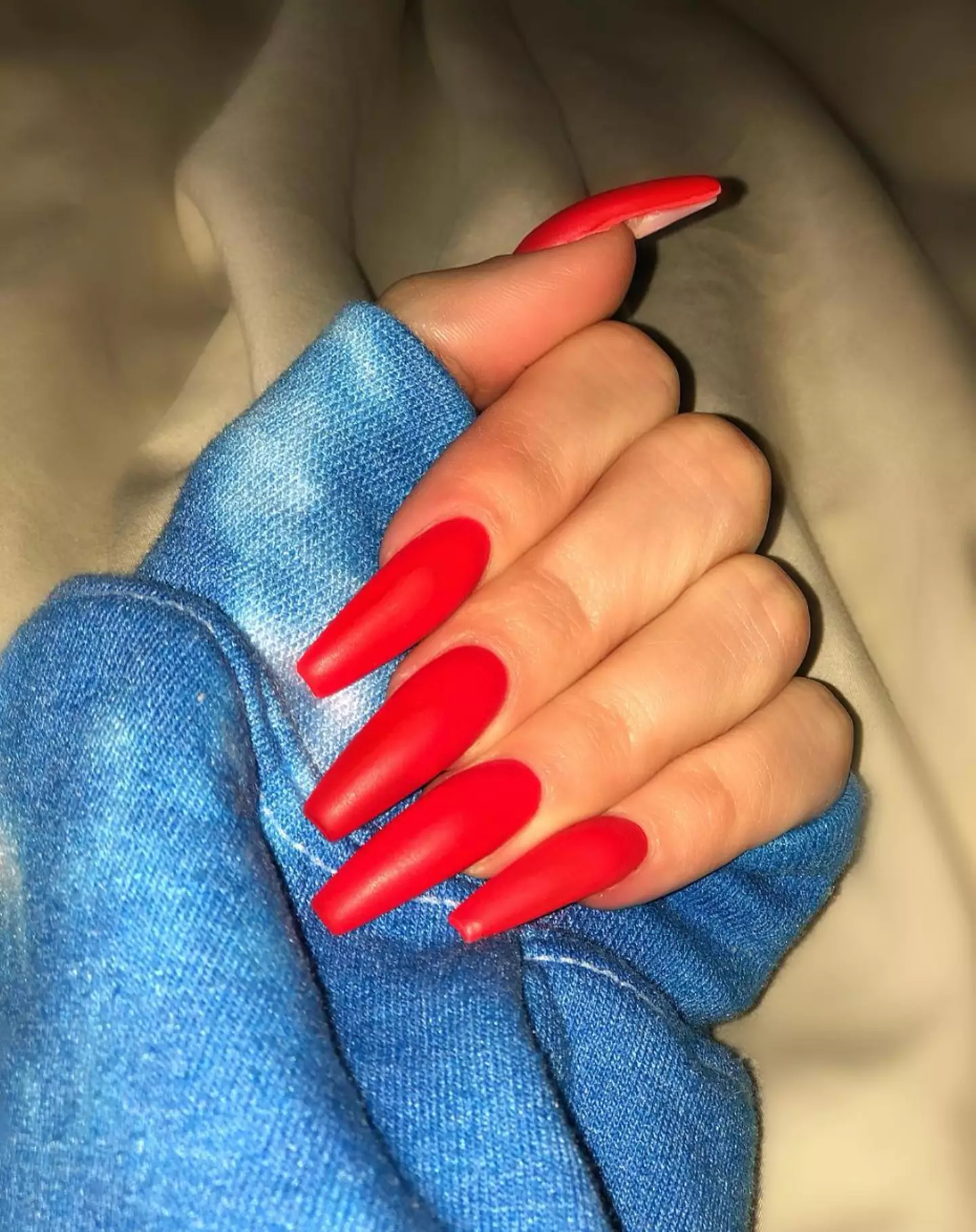 Khloé Kardashian has defended her long manicure.