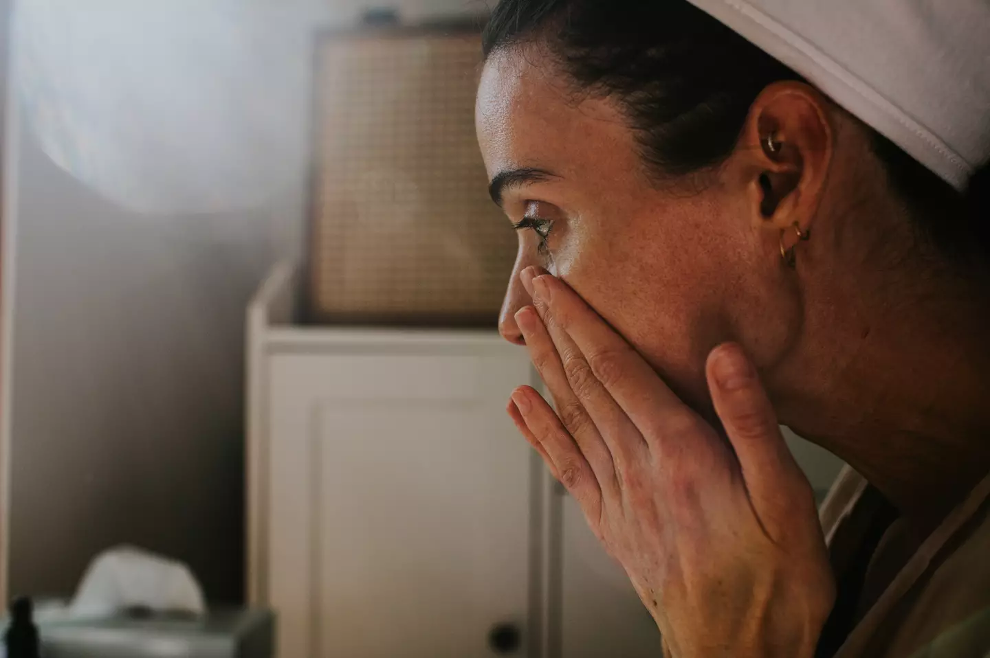 Facial swelling and discolouration can be symptoms of heart issues (Getty Stock Images)