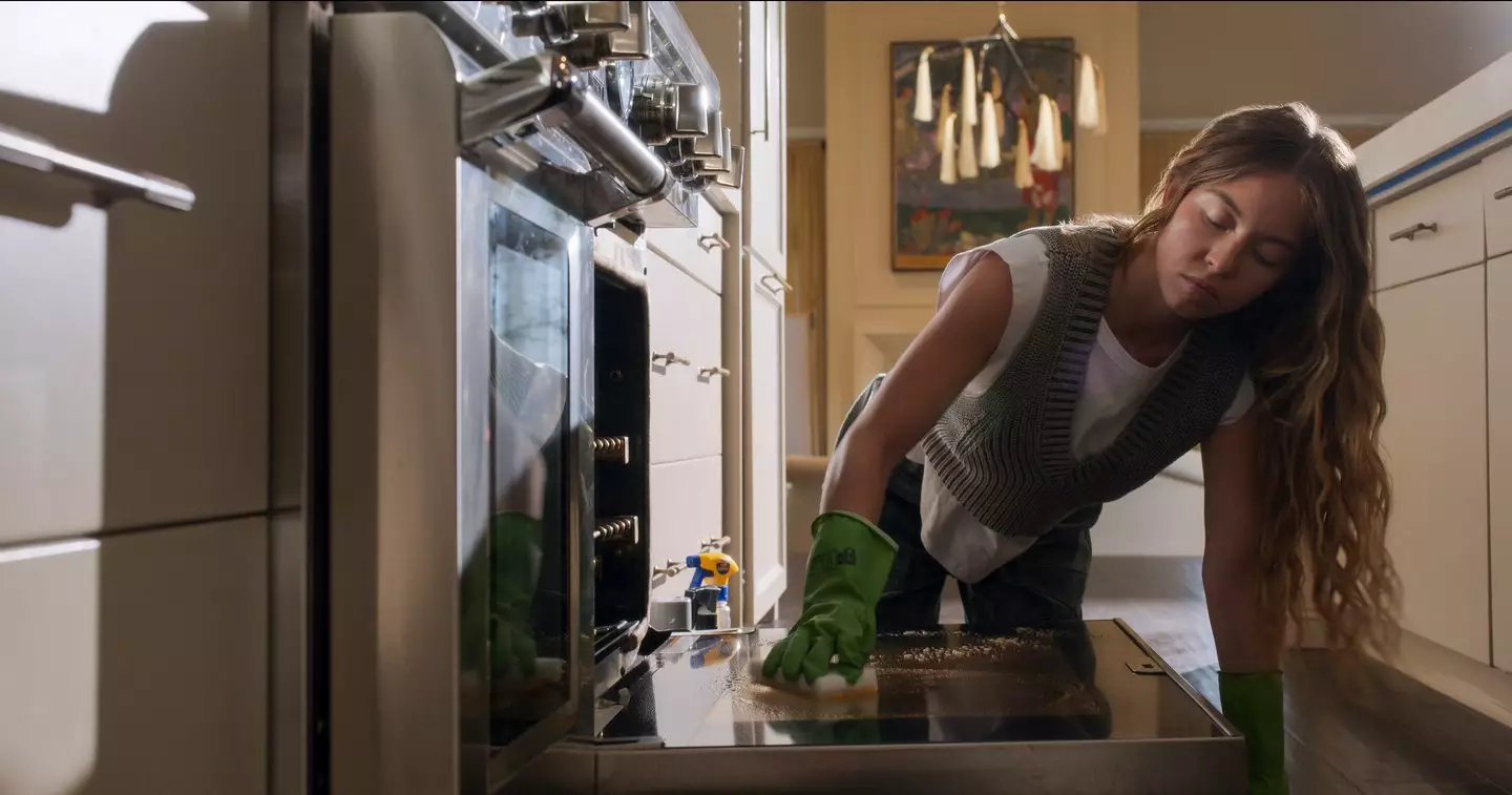 Millie (Sydney Sweeney) is punished for breaking a plate in the film (Lionsgate)