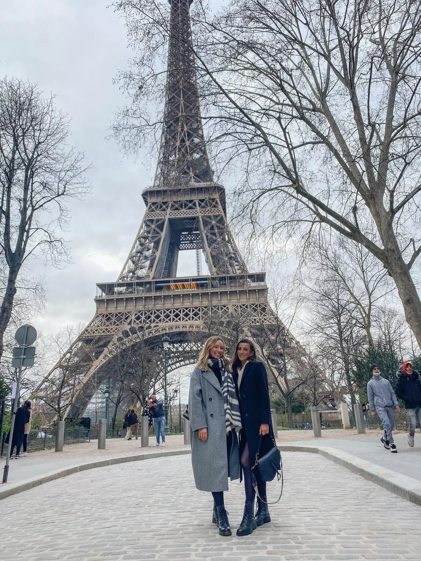 The pair sipped coffee near the Eiffel Tower.