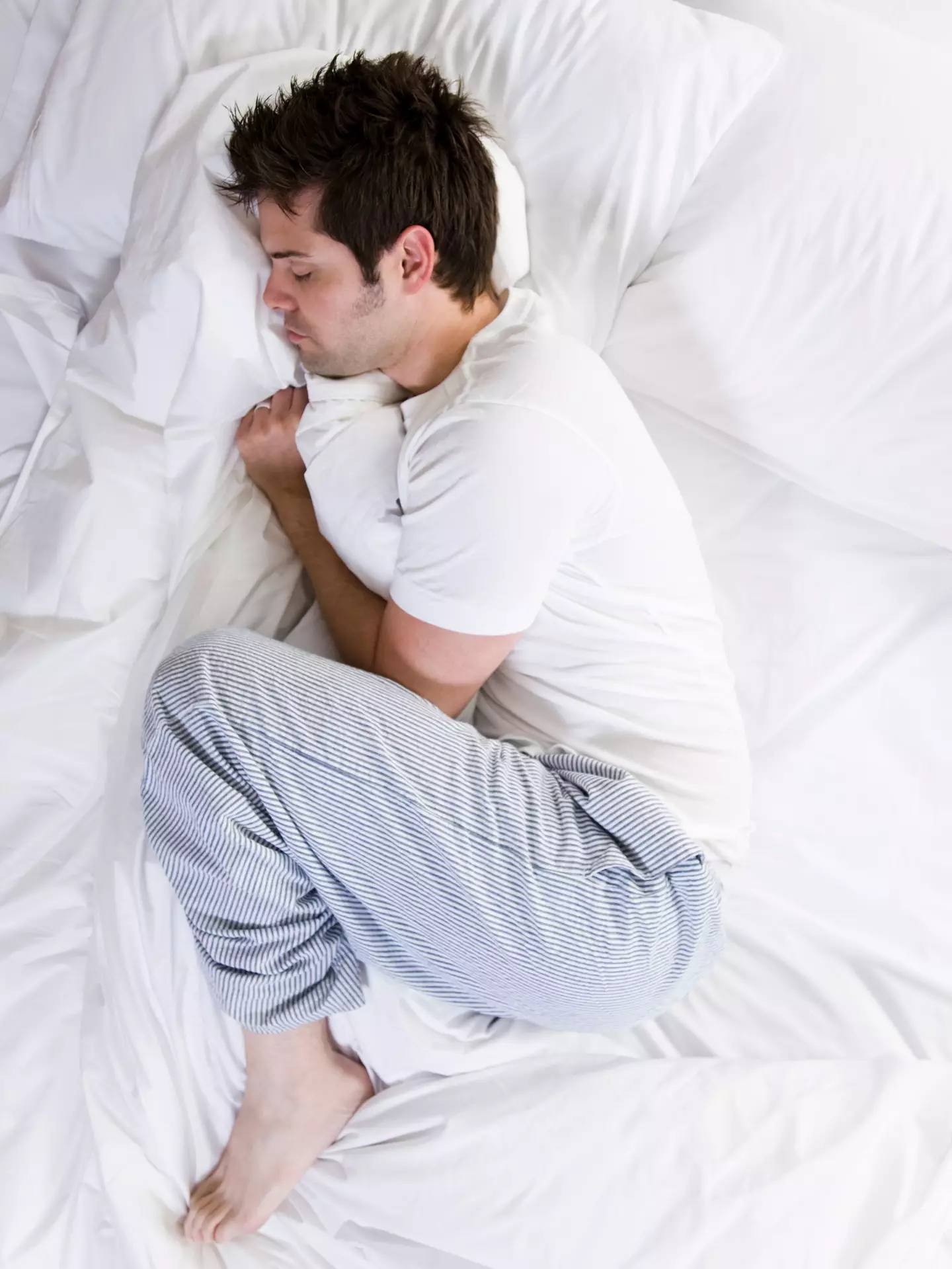 Health experts have warned against a particular sleeping position (Getty Stock Image)