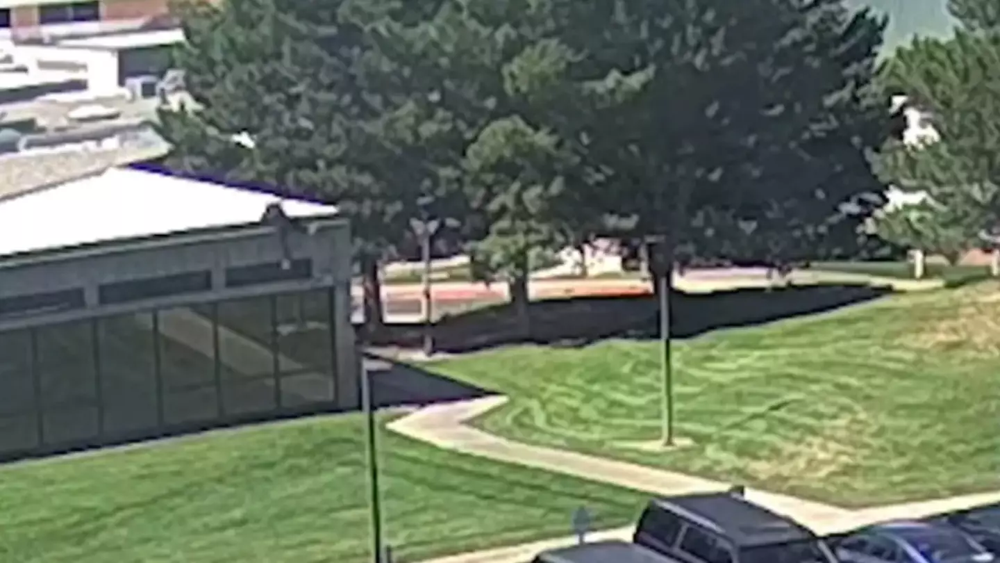 New footage of 'person of interest' fleeing from rooftop moments after Charlie Kirk assassination as FBI issues update on manhunt
