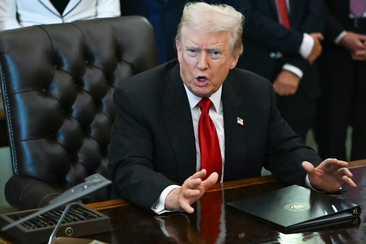 Trump issued a two-word demand in the seconds that followed (ANDREW CABALLERO-REYNOLDS/AFP via Getty Image)
