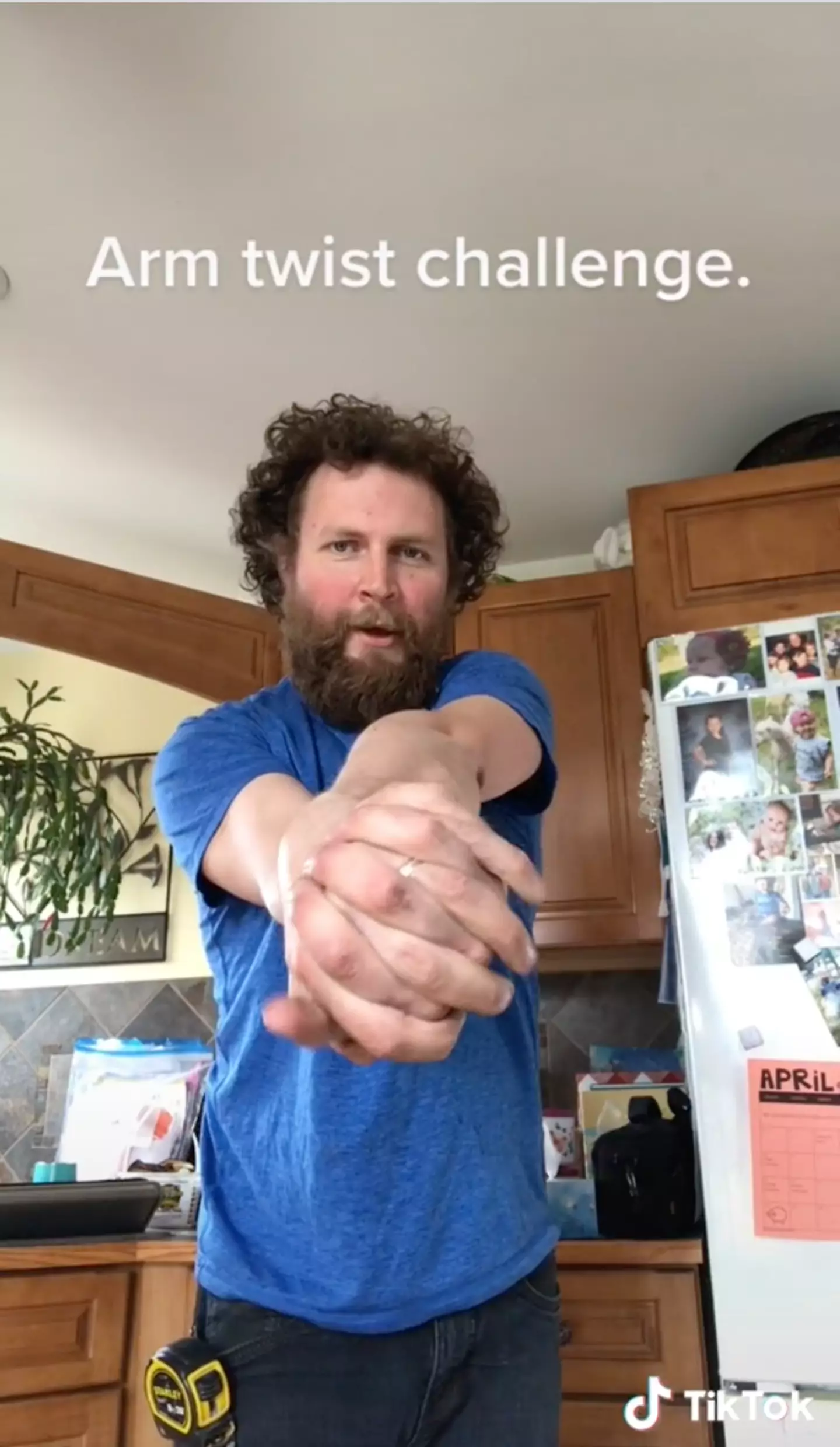 People are trying to master the arm twist challenge.