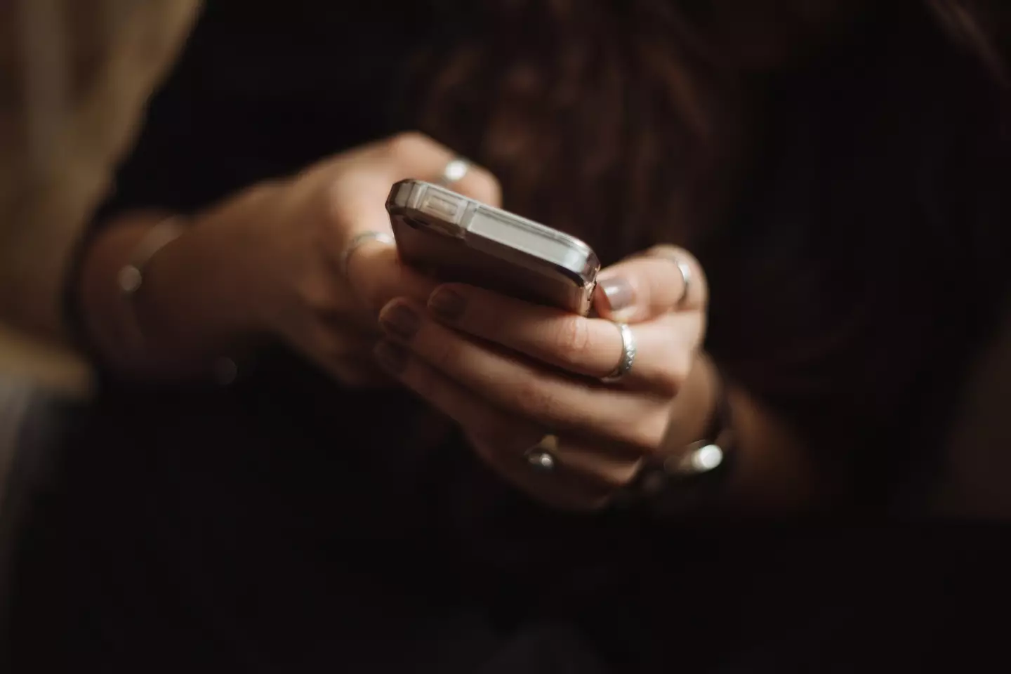 The woman looked through her fiancé's phone.