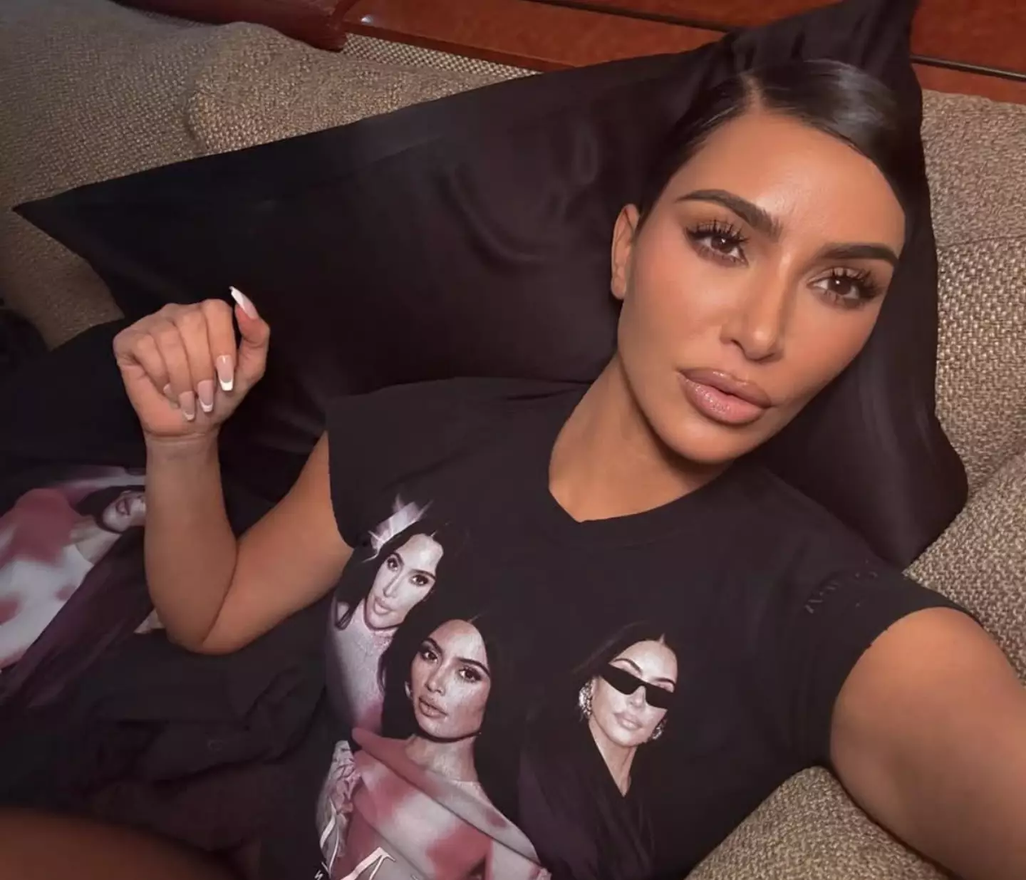 Kim Kardashian has been called out for her 'sickening' social media posts alongside a Tesla robot (Instagram/@kimkardashian)