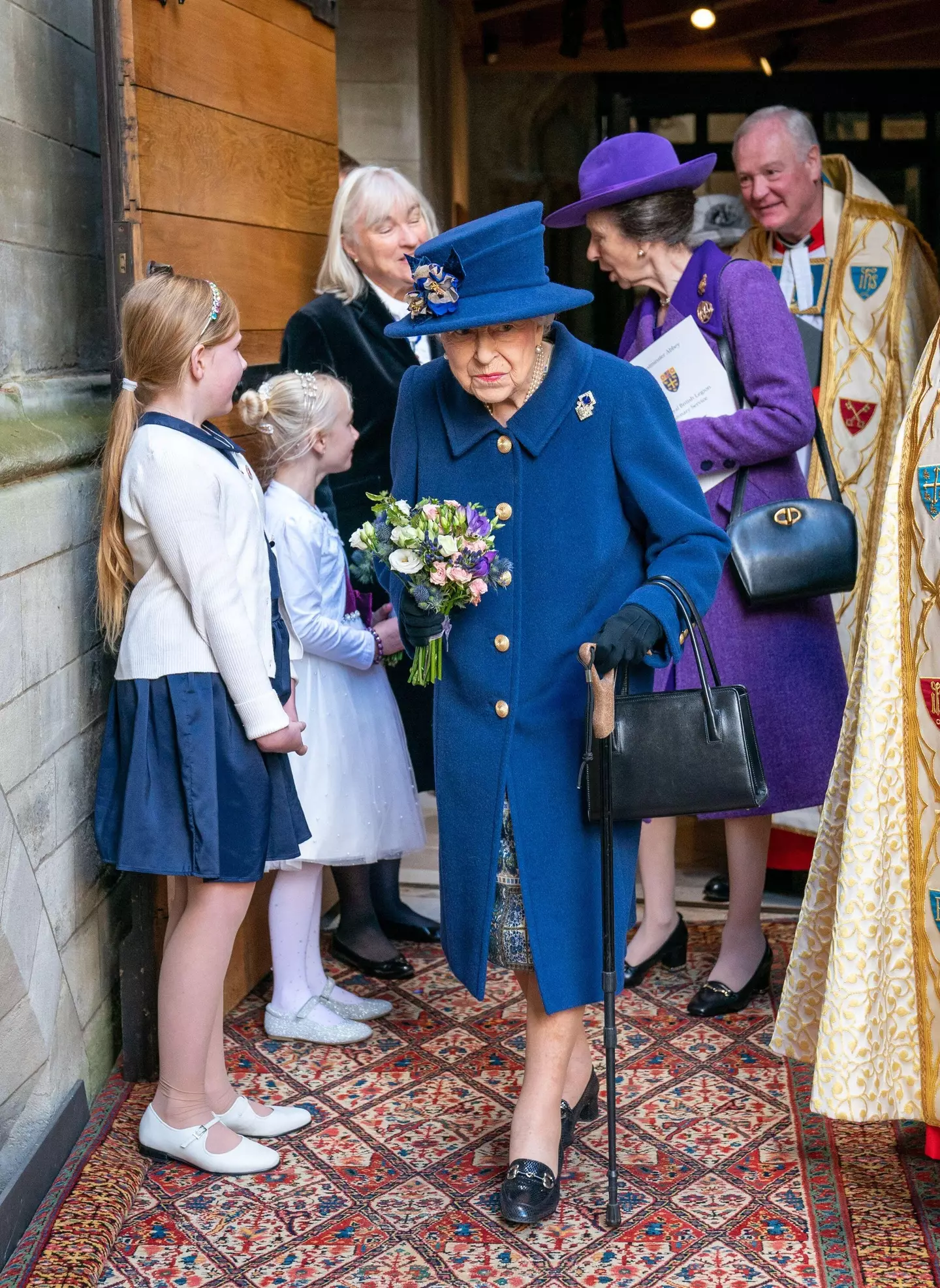 The Queen was seen using a walking stick (