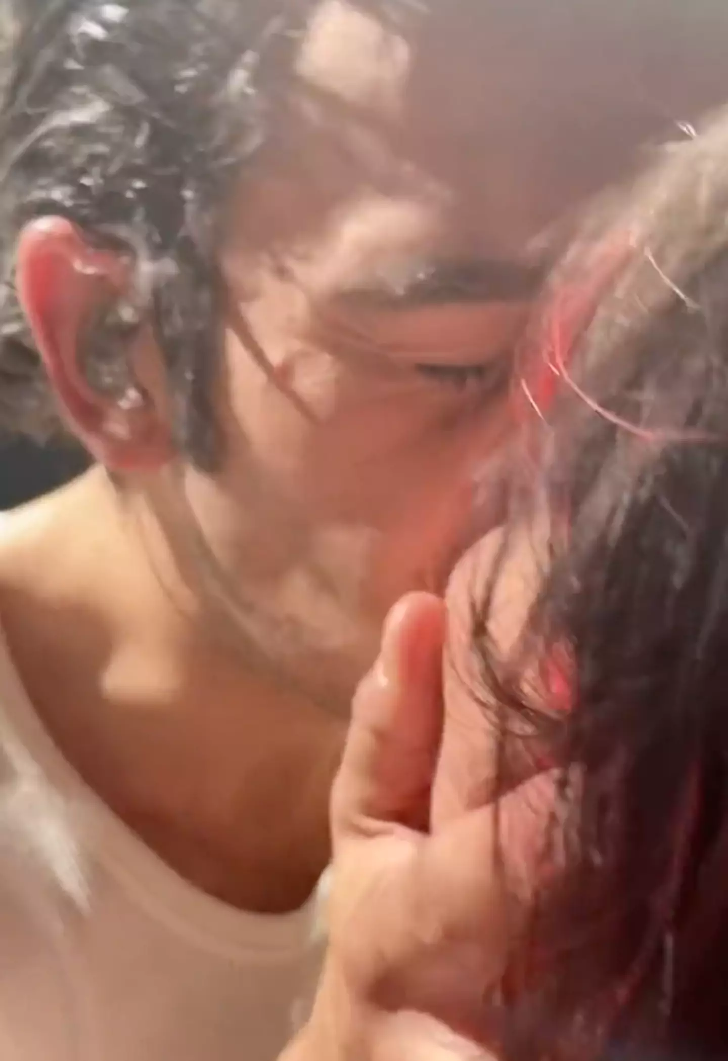 Social media users have been left divided over the kiss.