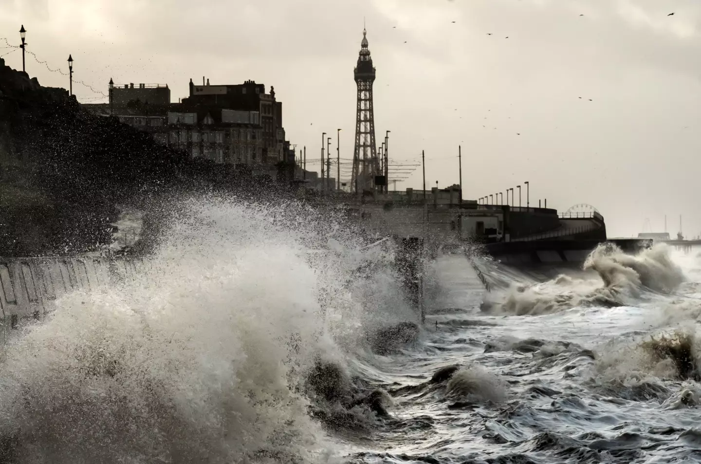 Waves break on the sea front in Blackpool.