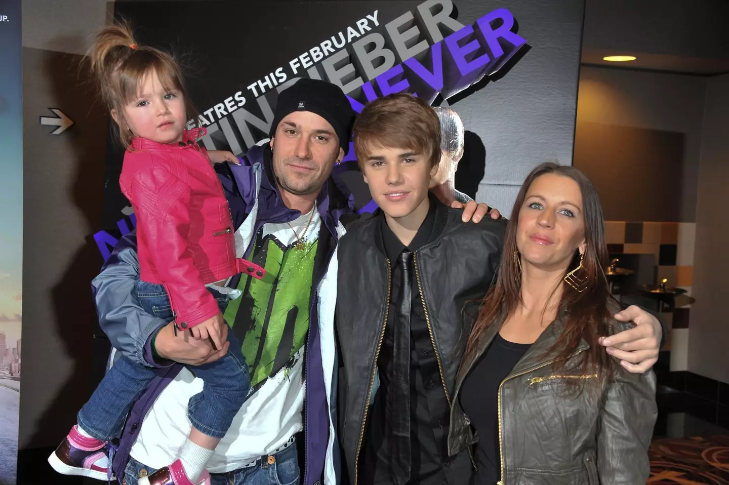 Justin Bieber with his parents and half-sister Jazmyn in 2011 (George Pimentel/Getty Images)