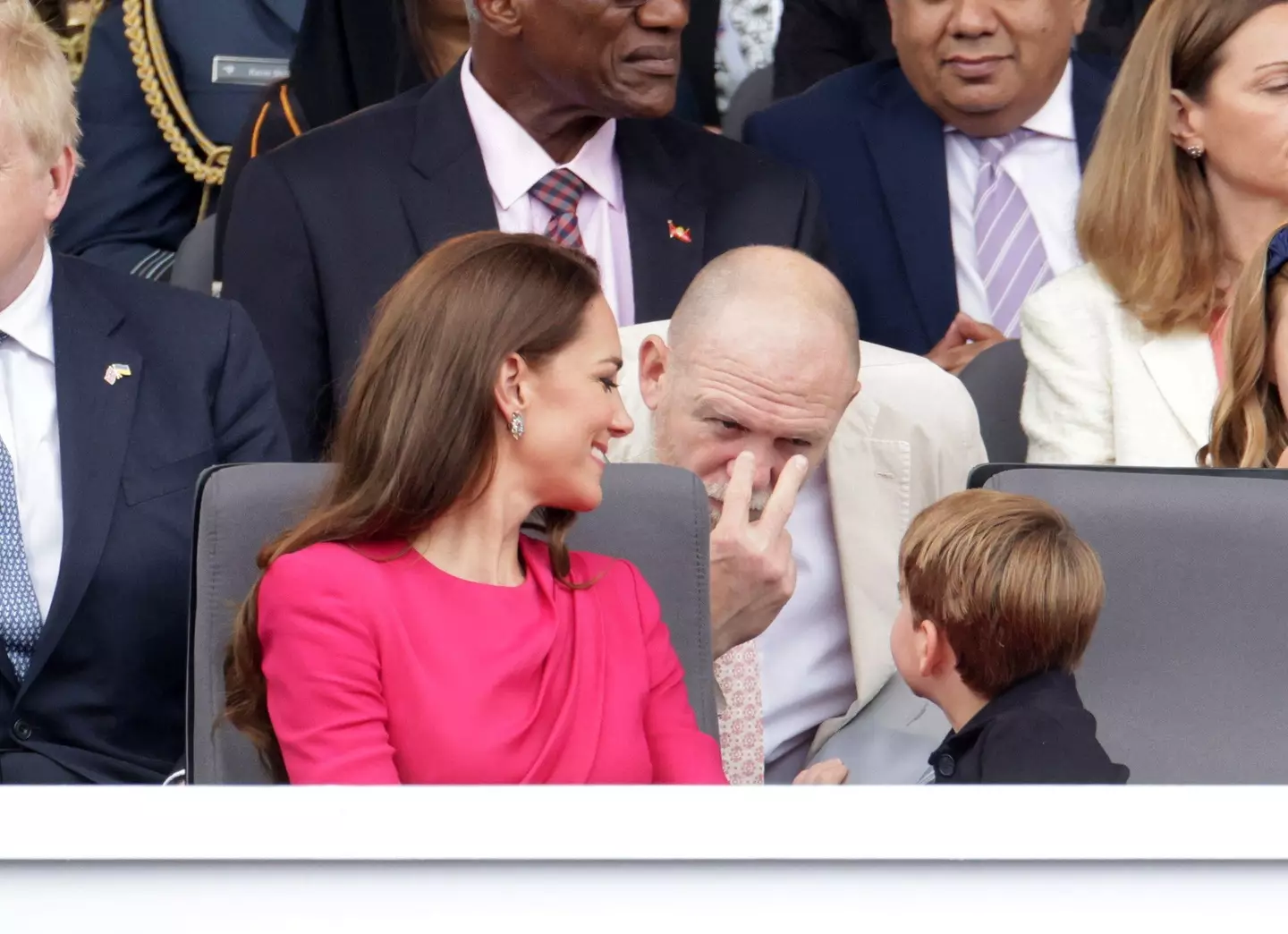 Mike Tindall gestures to Prince Louis at Platinum Jubilee Pageant.