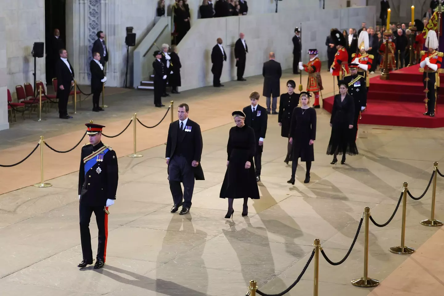 The princes stood shoulder to shoulder in Westminster Hall to hold a vigil by the Queen's coffin.