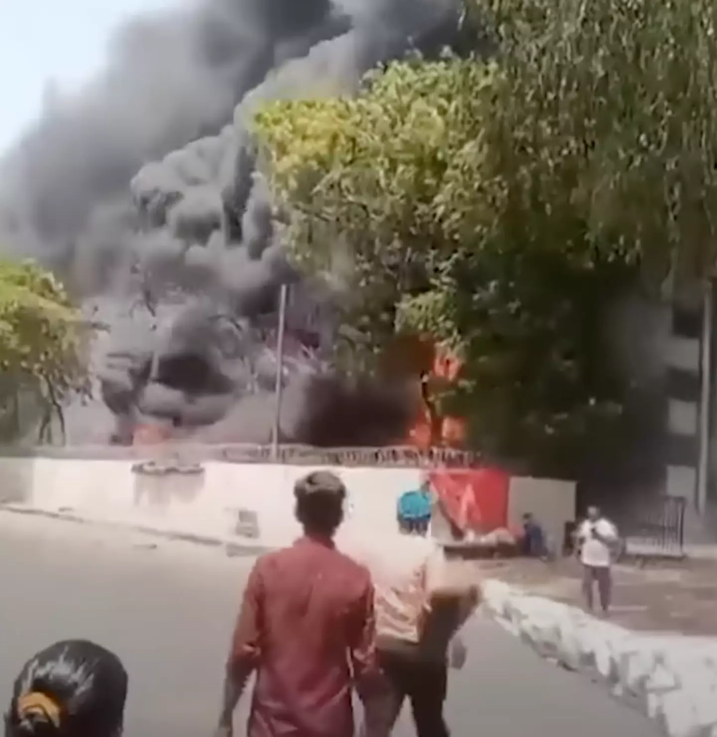 The video shows the moment Ramesh walked away from the disaster, relatively unharmed (India Today/YouTube/@narendamodi)