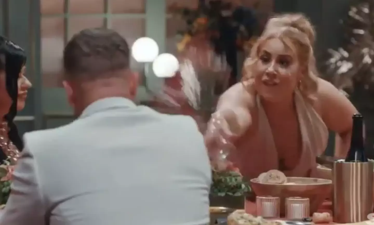 Polly shocked viewers by swilling Adam with a glass of wine (Channel 4)