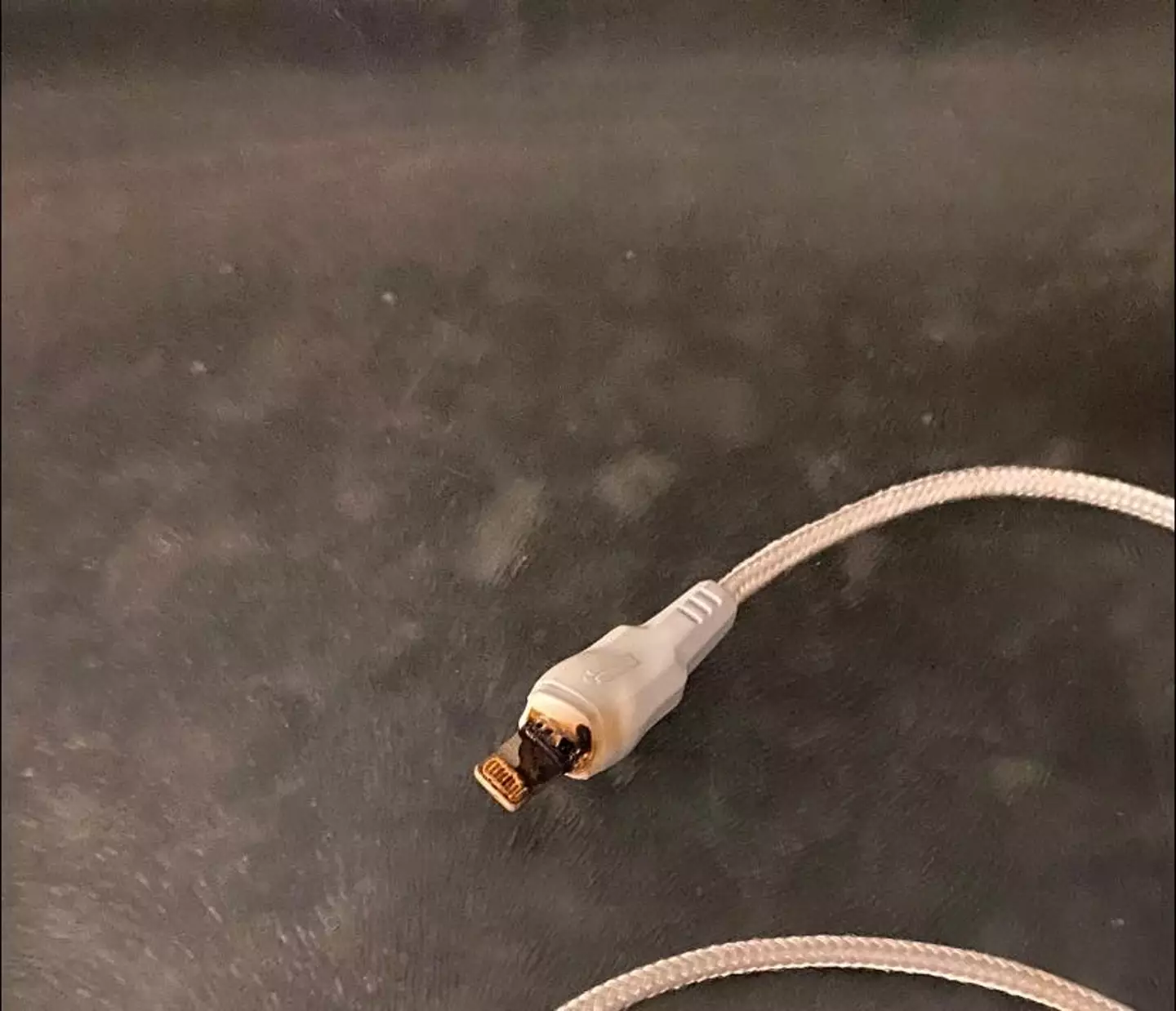 A mum issued a stark warning after her cheap charger started to burn.