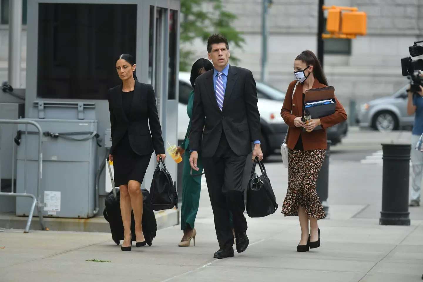 R Kelly's lawyers arriving at the New York courtroom (