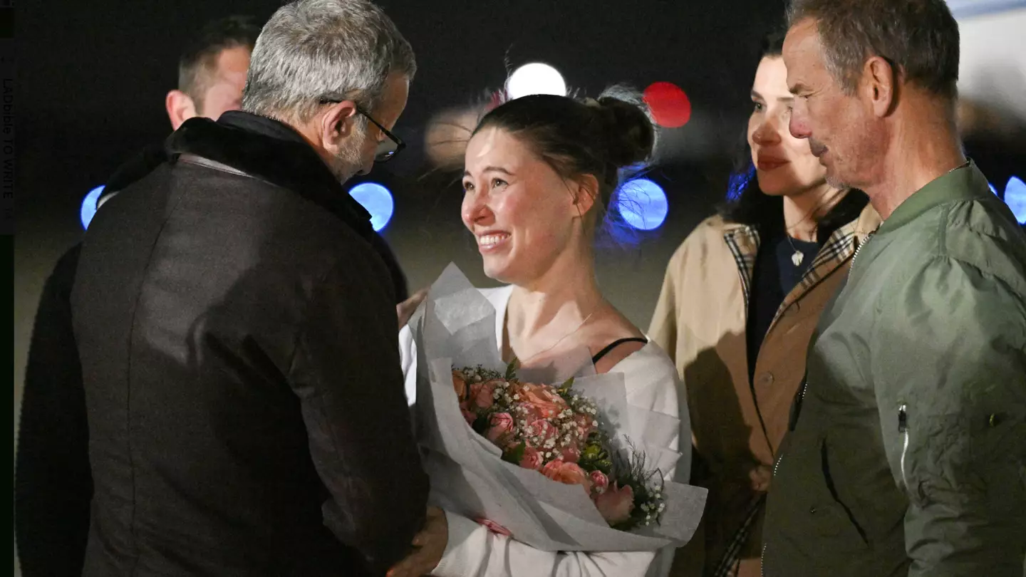 Freed ballerina Ksenia Karelina returns to US after being sentenced to 12 years in Russian jail over donation