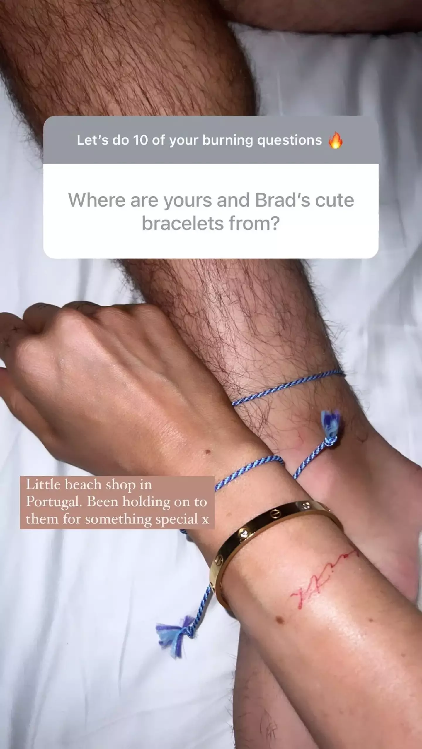 Attwood and Dack have matching blue bracelets.