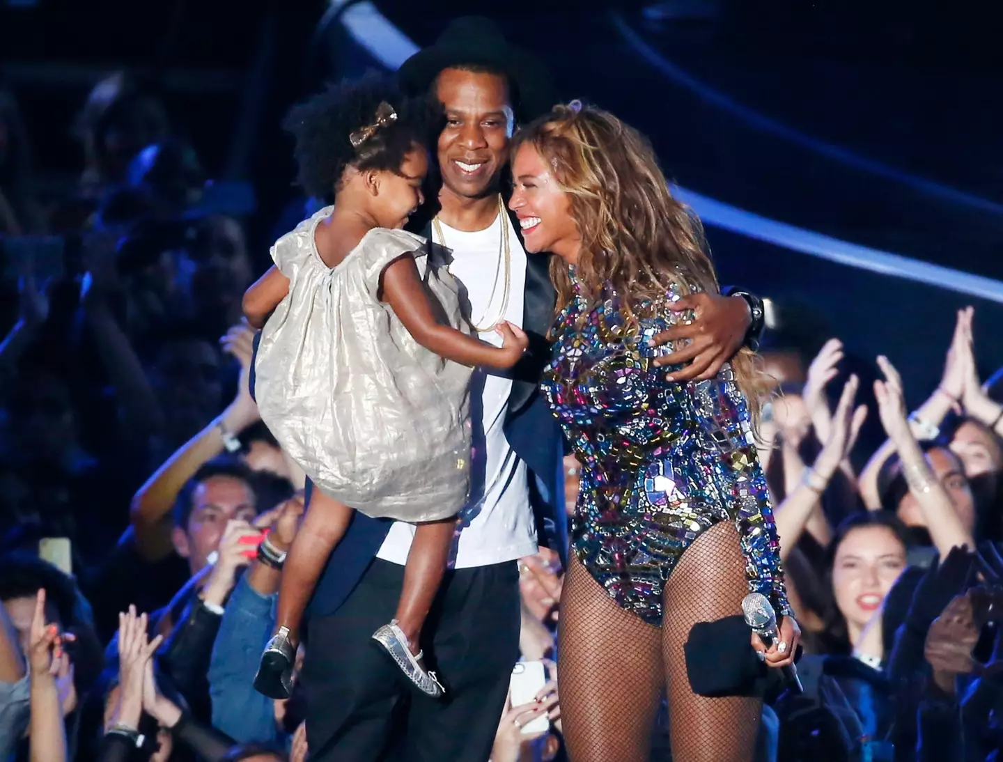 Blue Ivy with her famous parents, Jay-Z and Beyoncé.